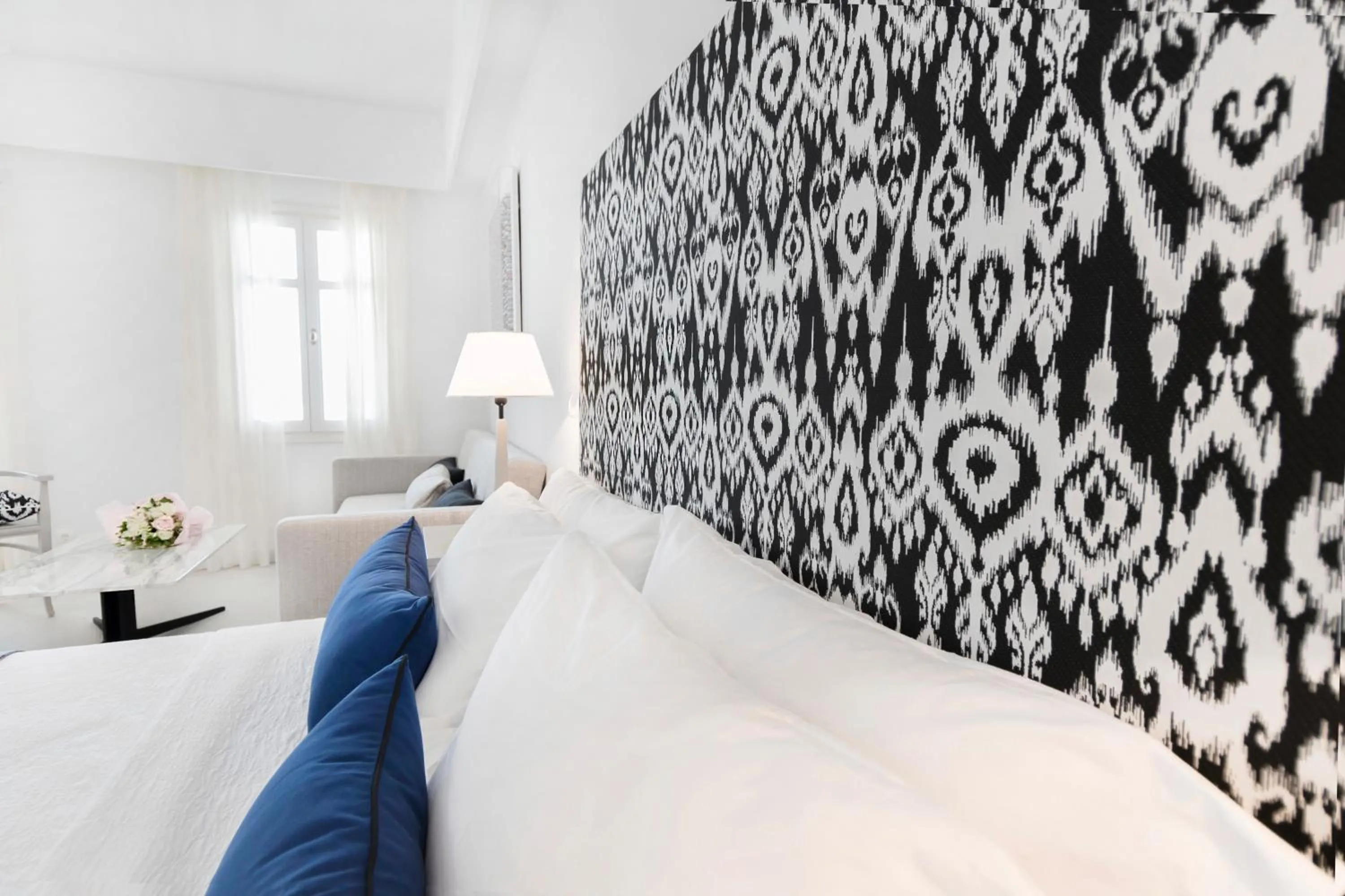 Bed in Stelia Mare Boutique Hotel