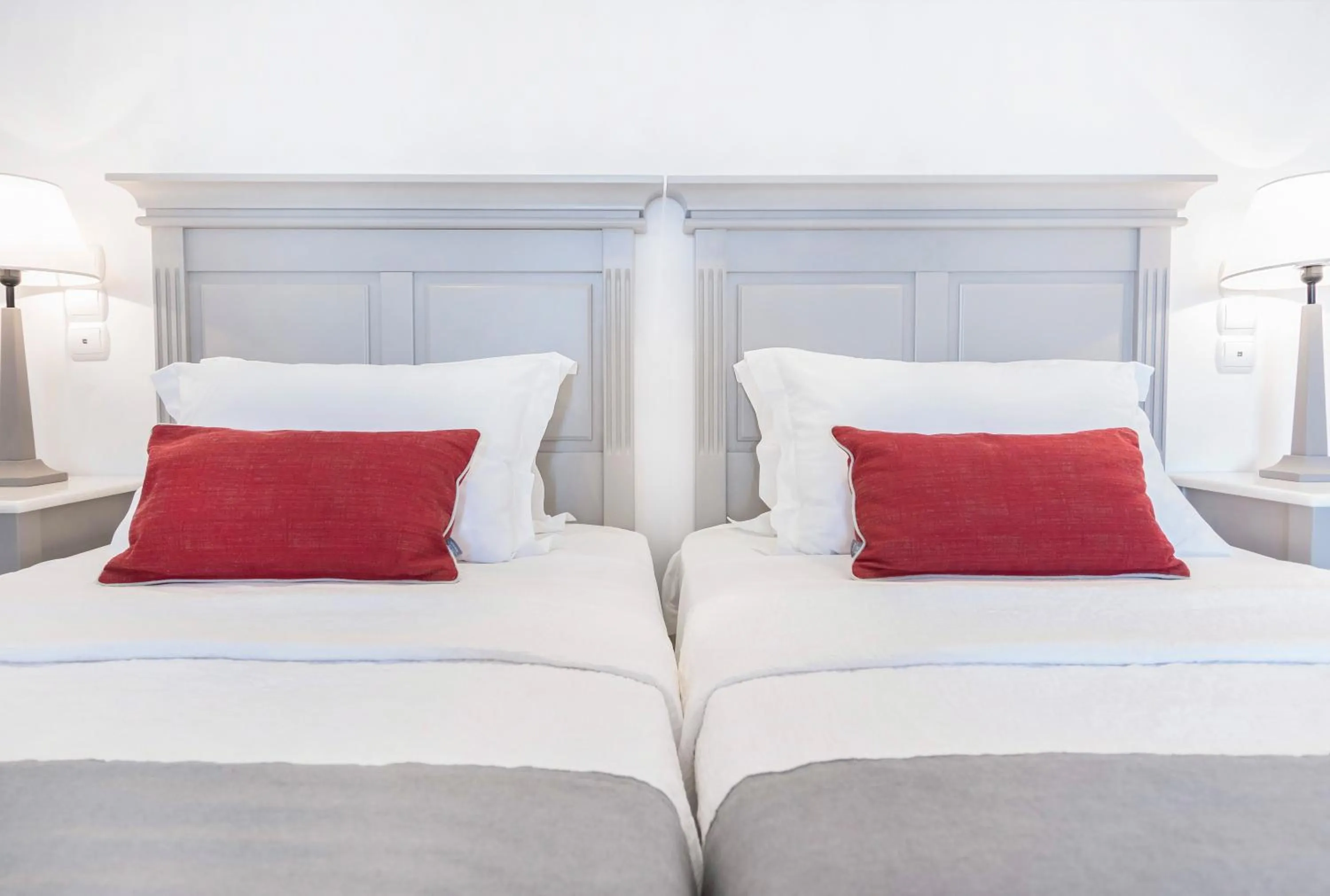 Bed in Stelia Mare Boutique Hotel