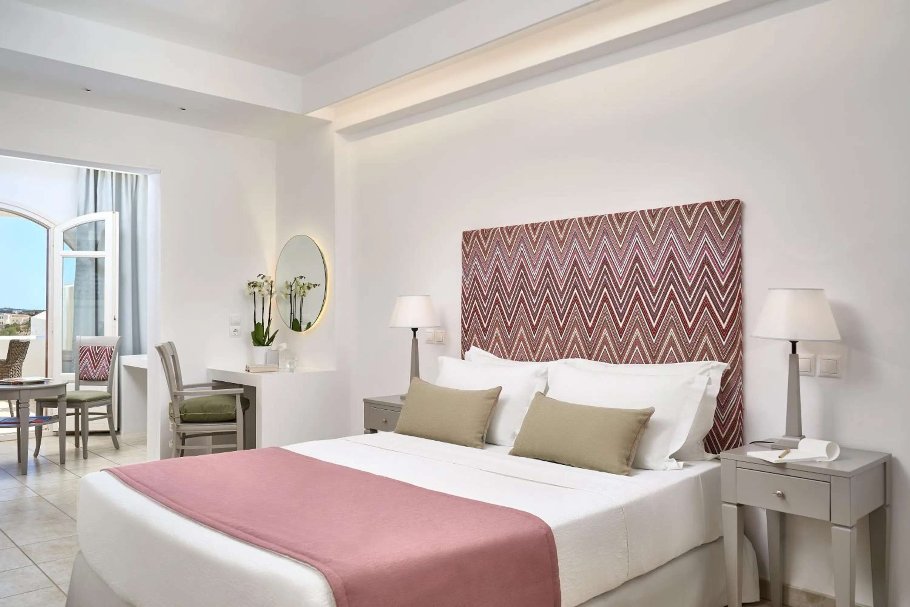 Bed in Stelia Mare Boutique Hotel