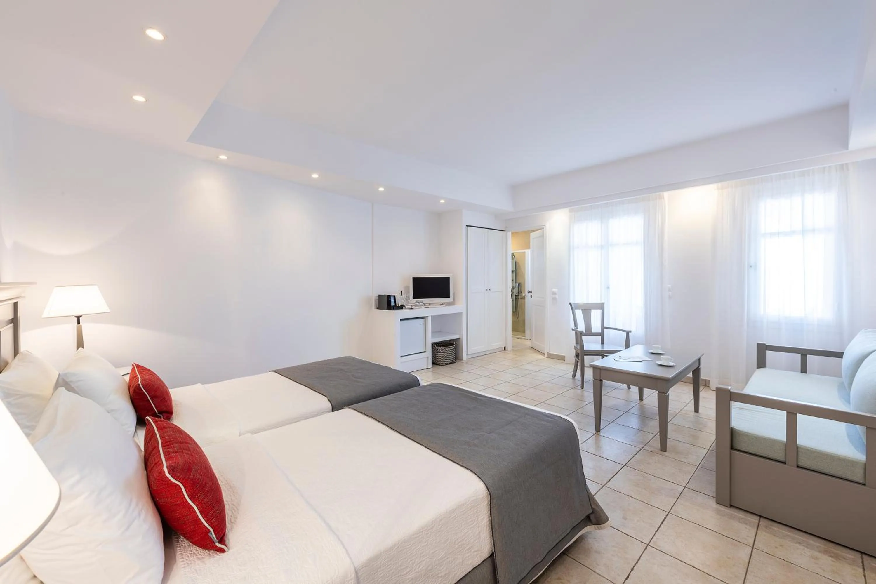 Bed in Stelia Mare Boutique Hotel