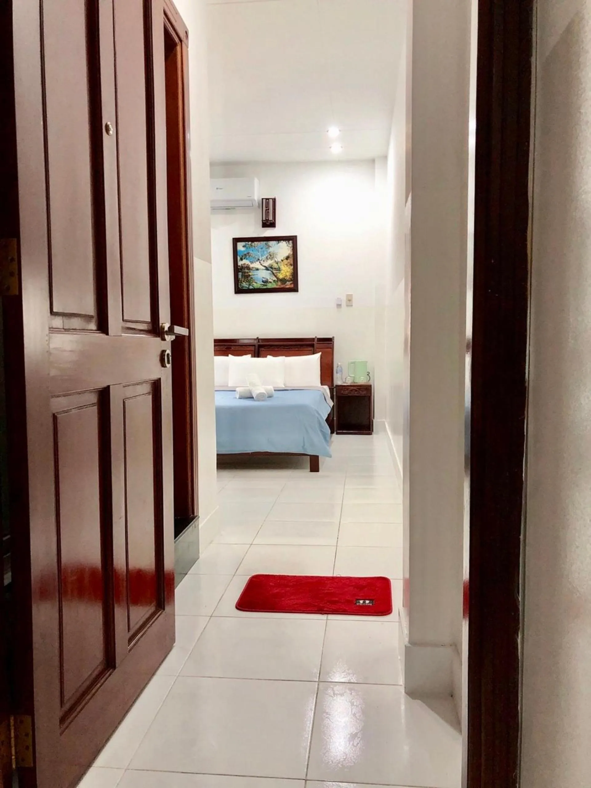 Bed in SaiGon CoZy Hotel "241 Pham Ngu Lao Street''