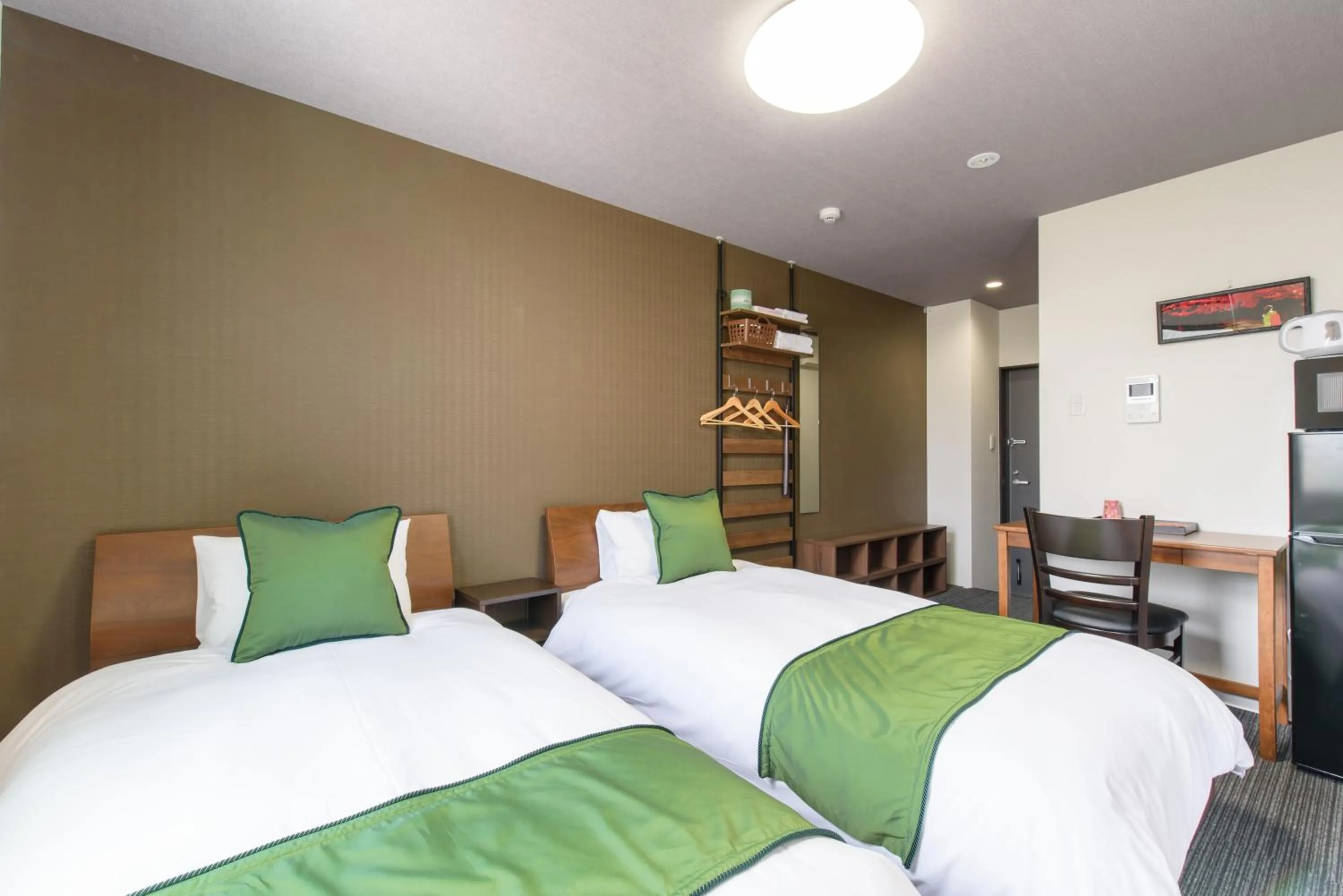 Bed in JP INN Kyotoeki Kita Gakurincho