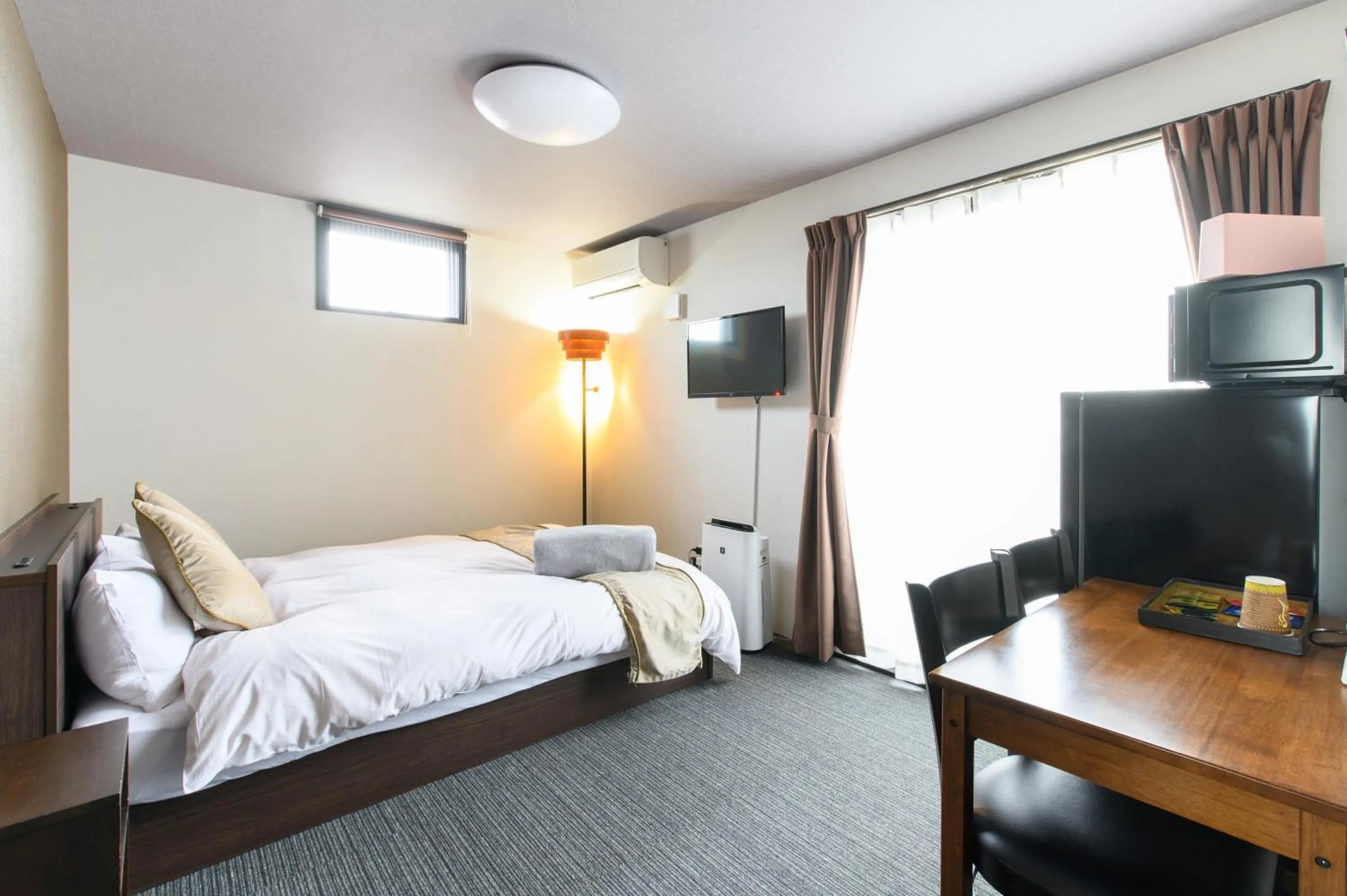 Bed in JP INN Kyotoeki Kita Gakurincho