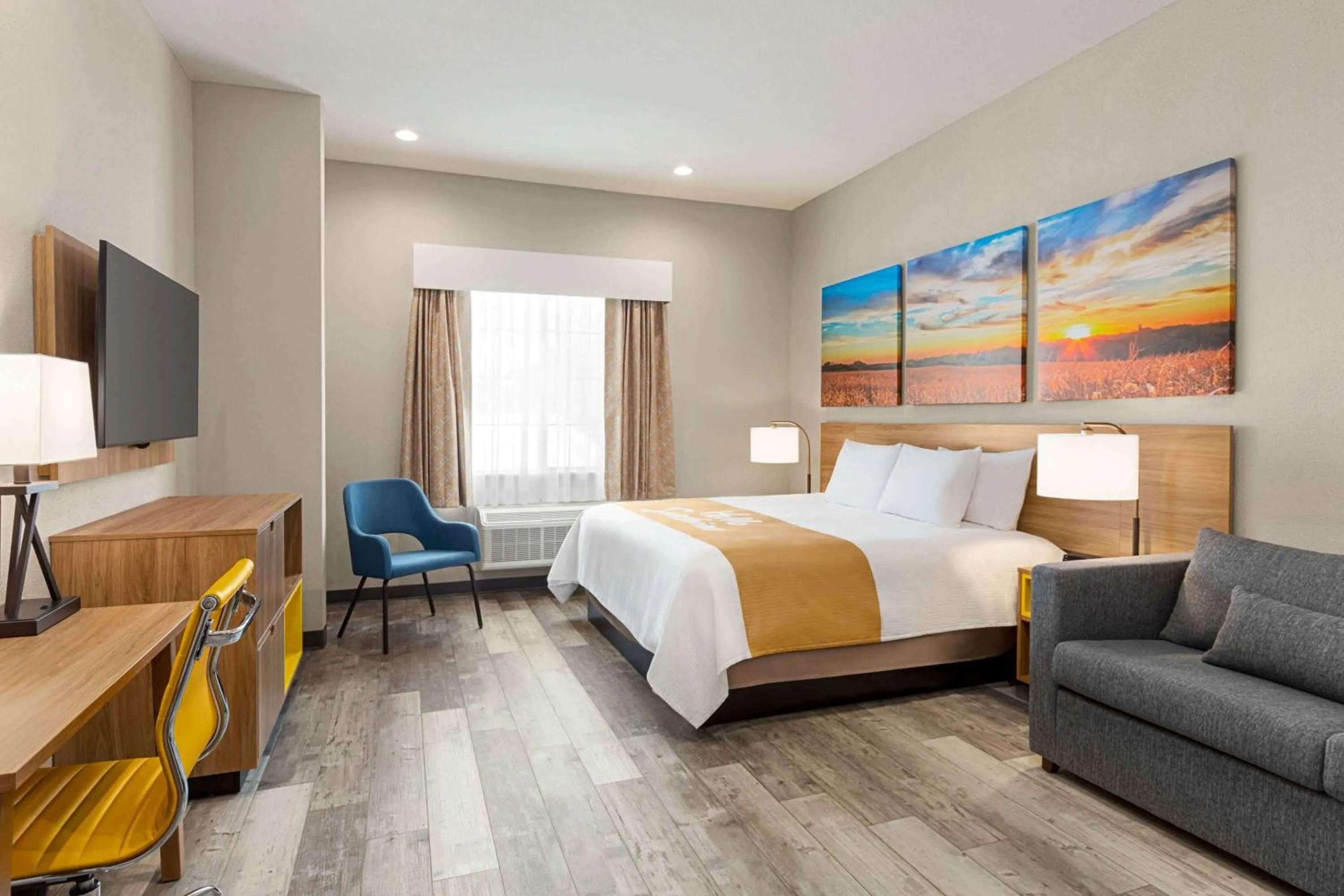 Photo of the whole room, Bed in Days Inn & Suites by Wyndham Greater Tomball