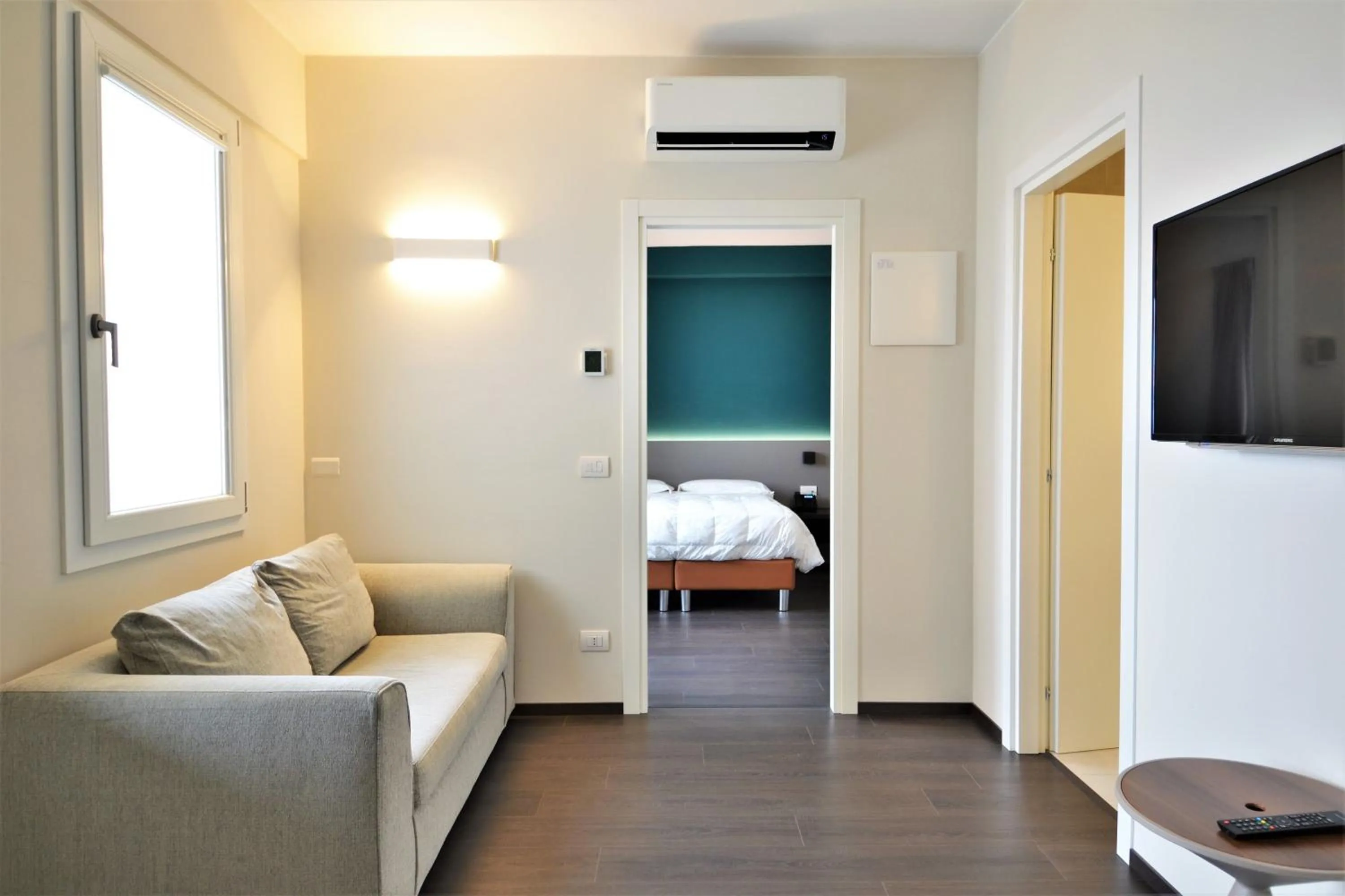 Bed in Venice Terminal Apartments & Suites