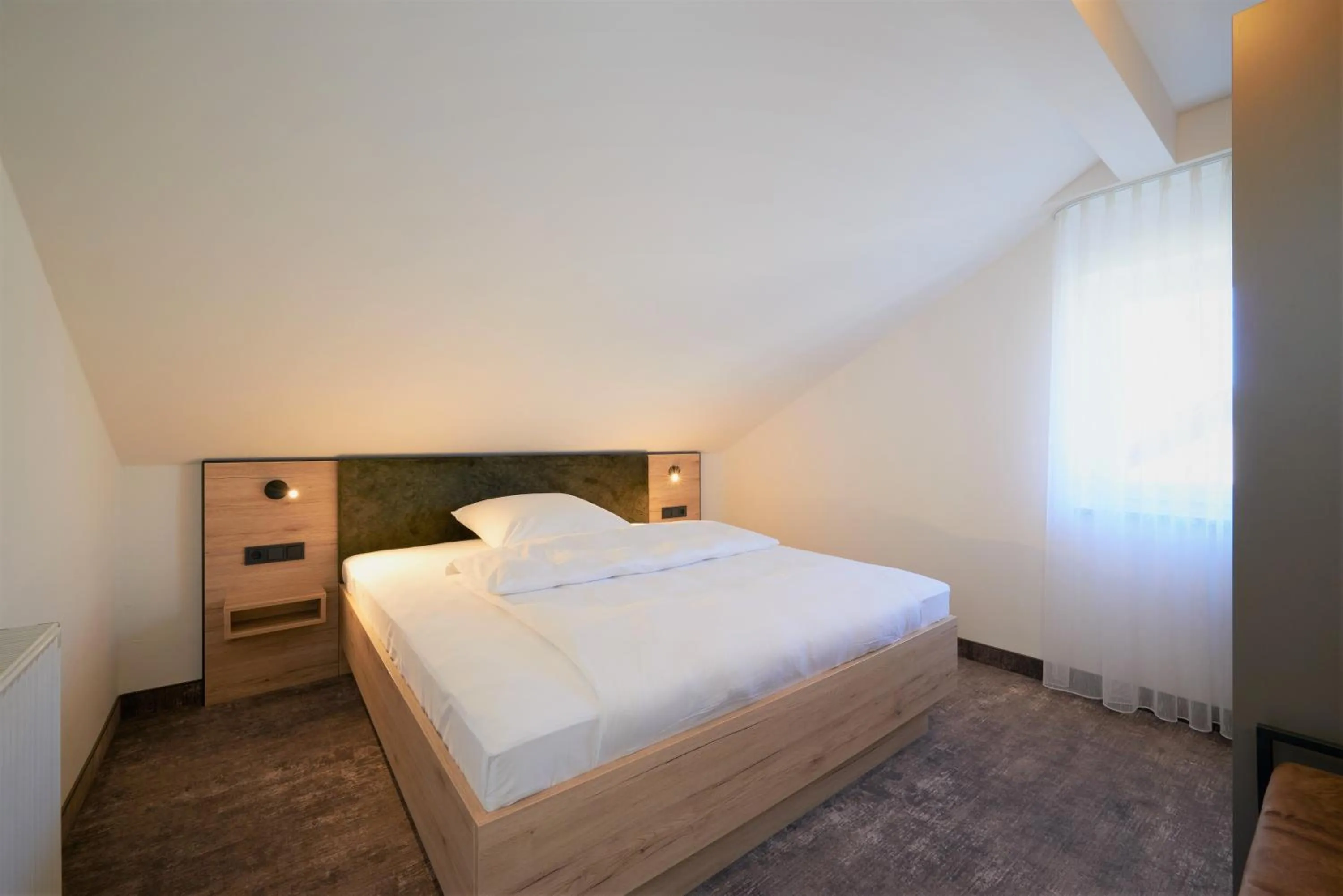 Bed in Schneider APARTMENT ALLERSBERG