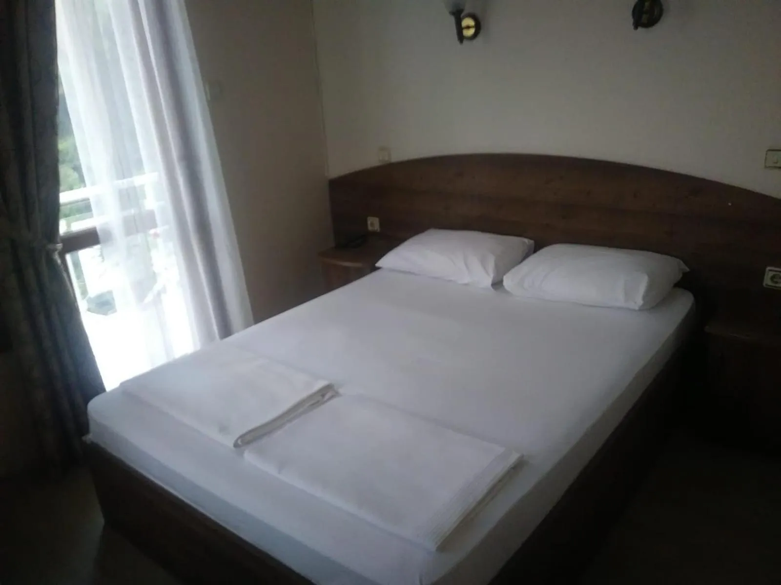 Bed in LİMON OTEL FOÇA