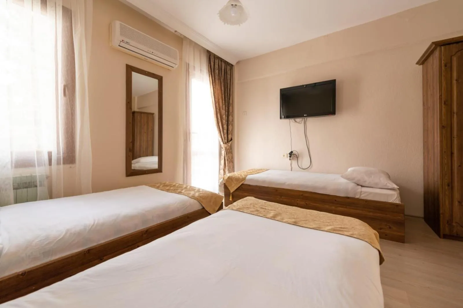Photo of the whole room, Bed in LİMON OTEL FOÇA