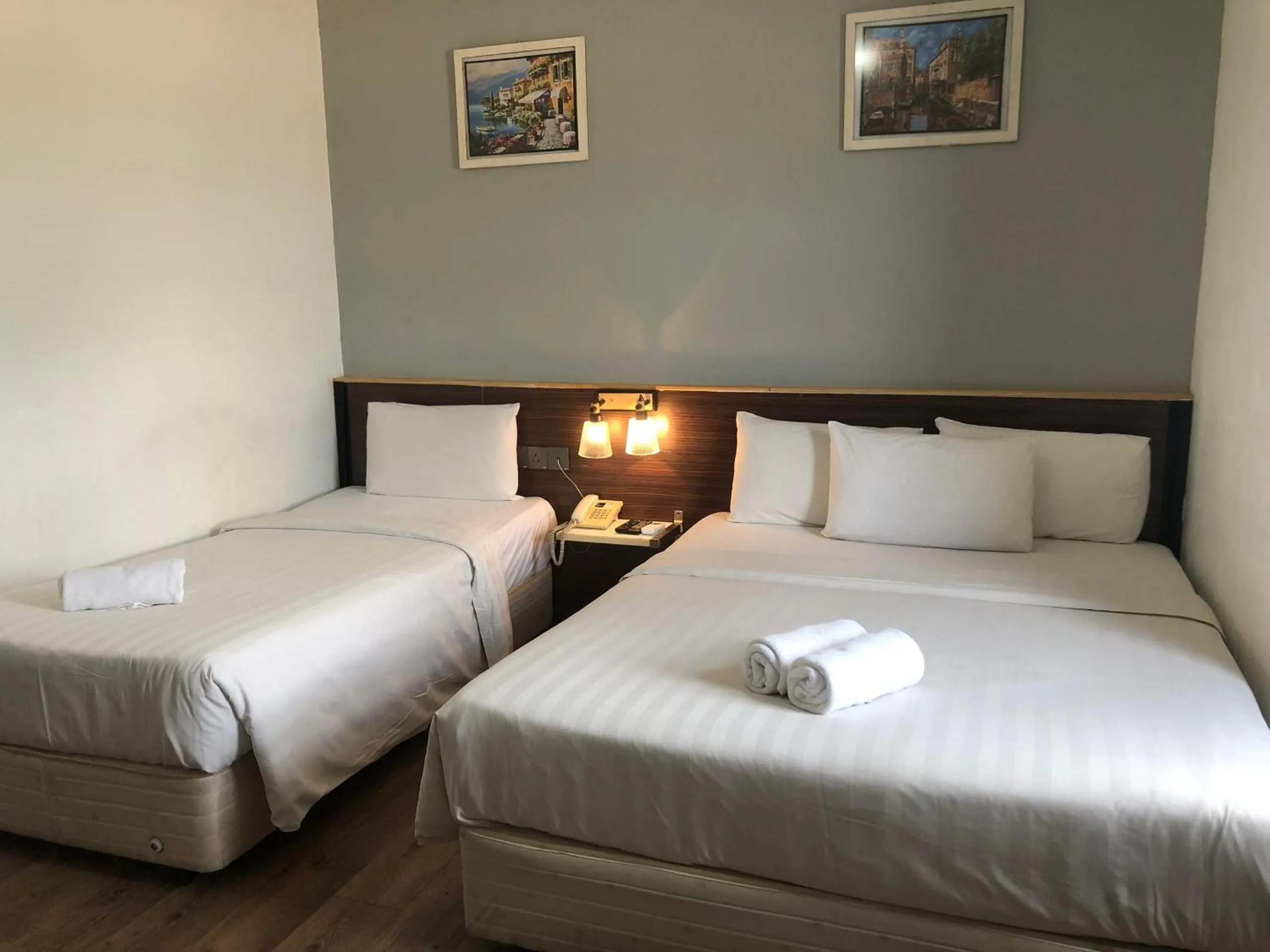 Bed in Ridel Sunset Hotel