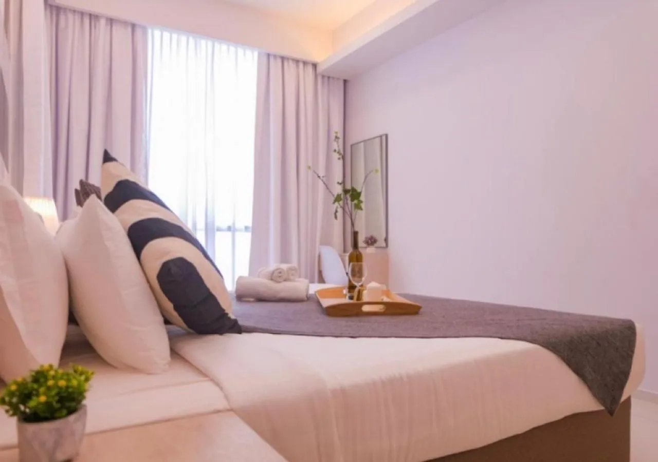 Bed in Robertson PanoramaKL Suites