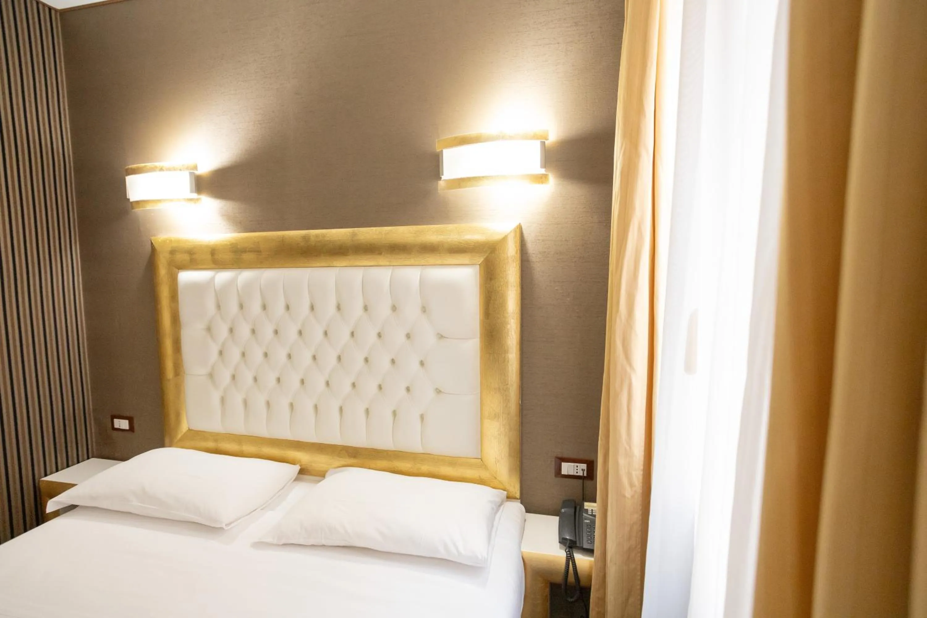 Bed in Duomo Boutique Hotel