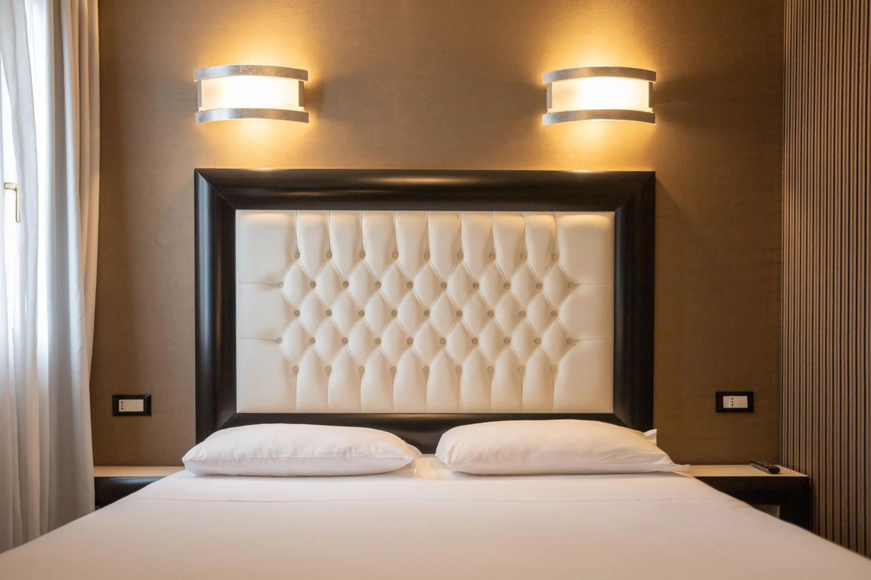 Bed in Duomo Boutique Hotel