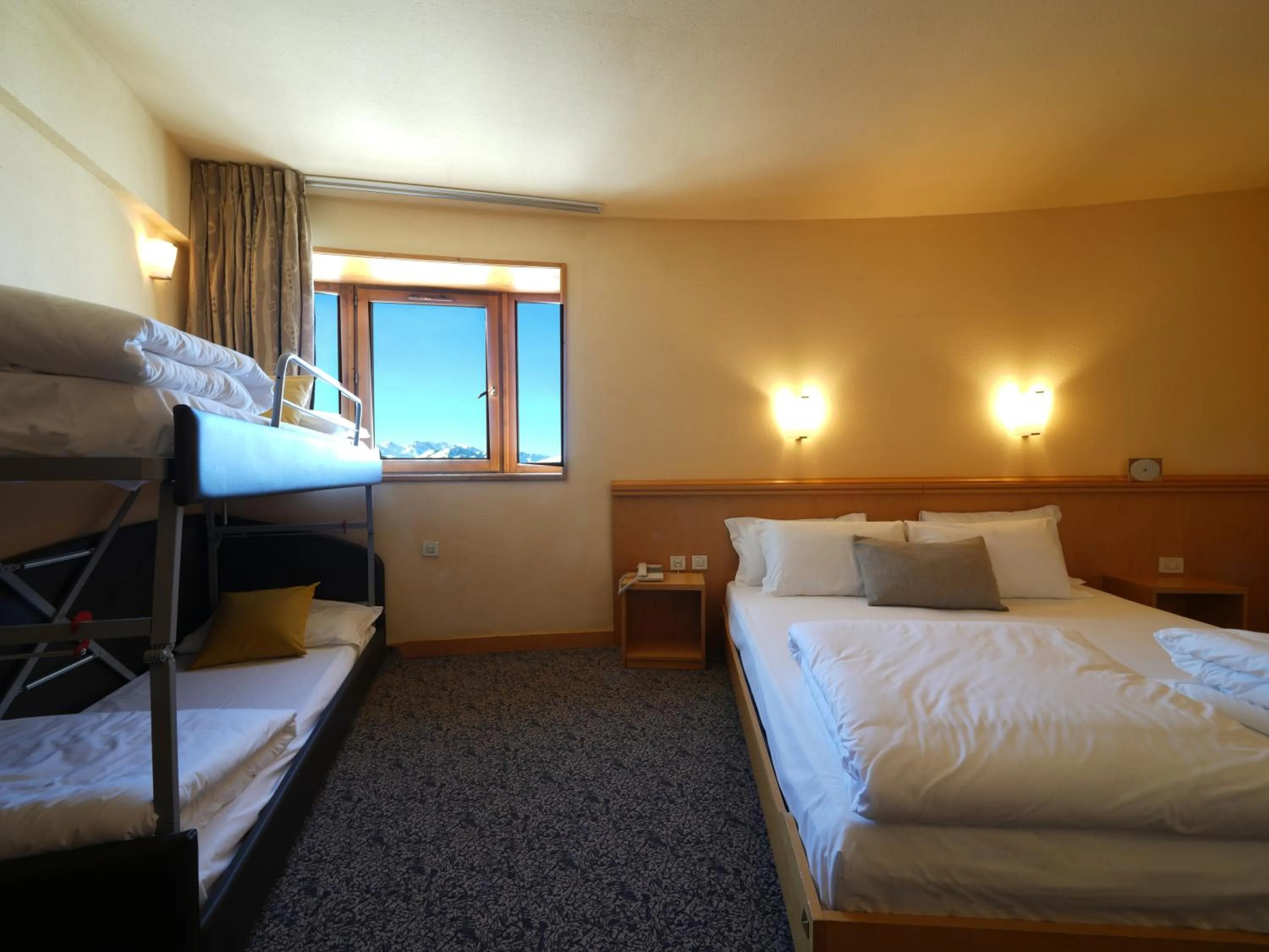 Bed in Hotel Club Uappala Sestriere