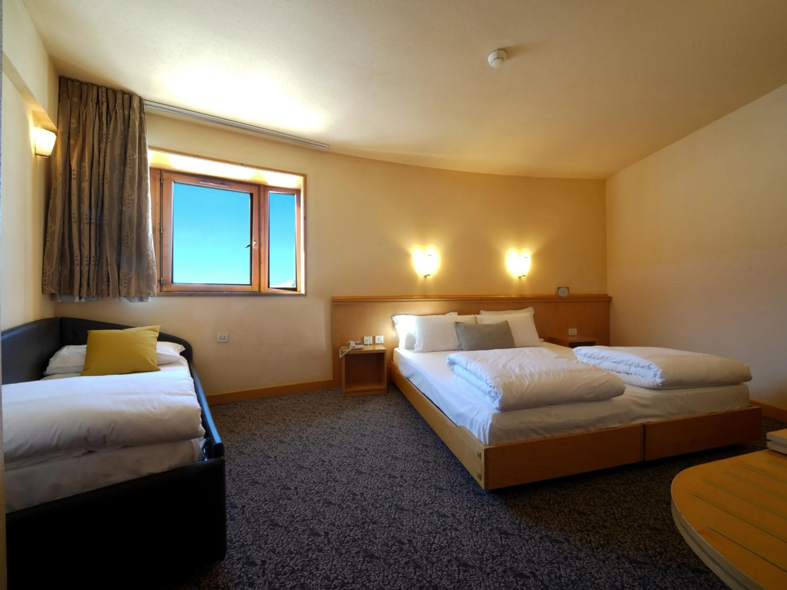 Bed in Hotel Club Uappala Sestriere
