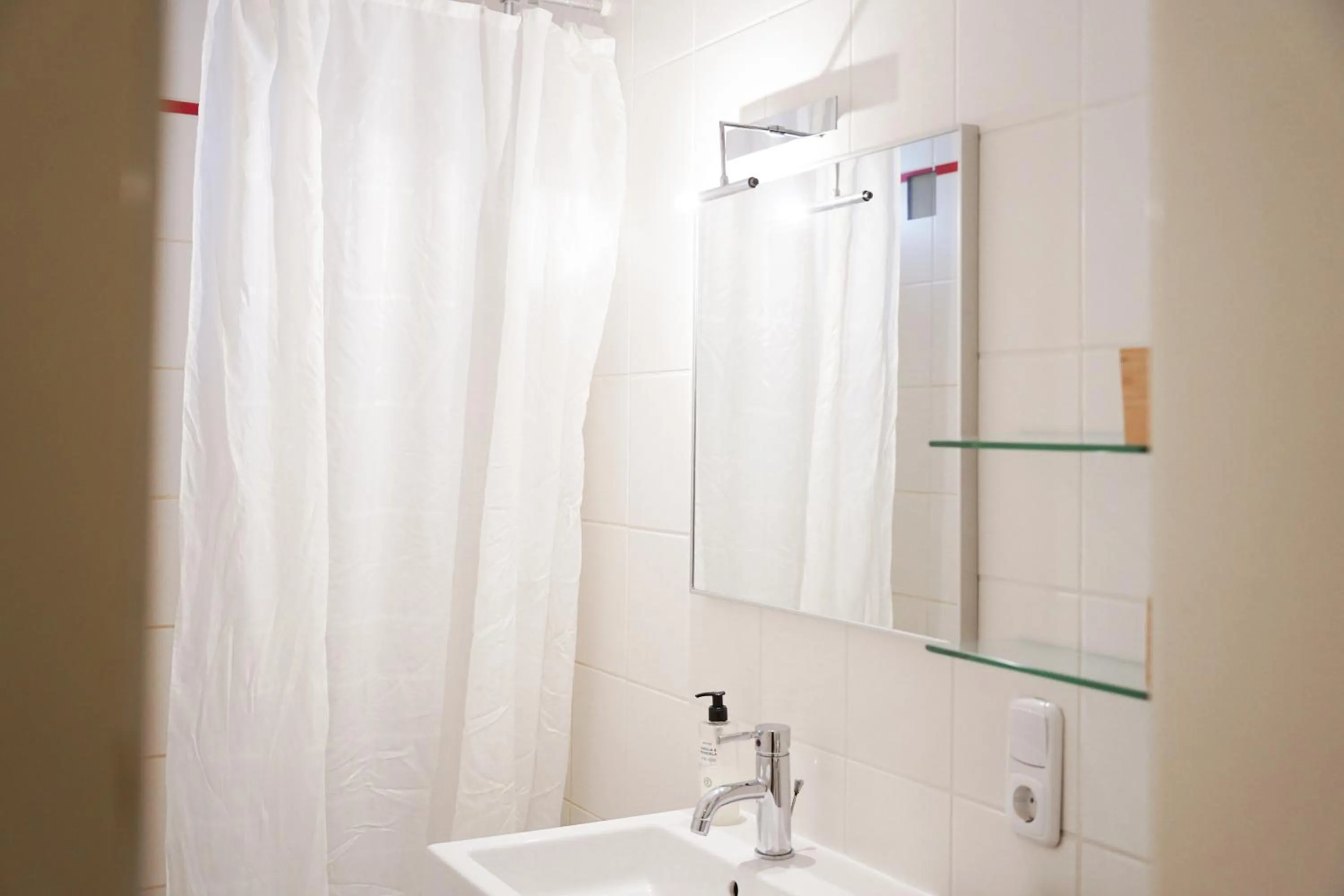 Shower in urraum Hotel