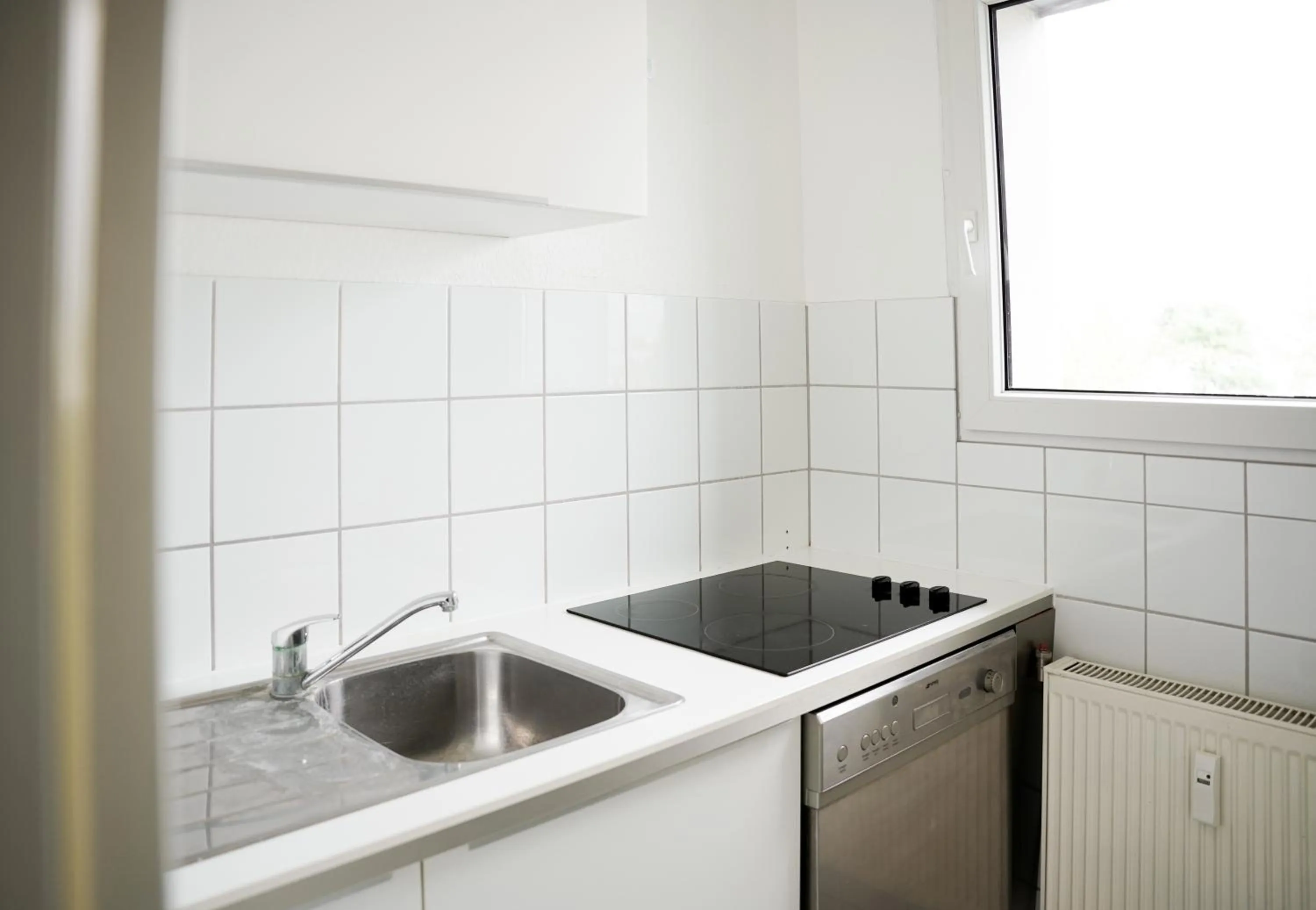 Kitchen or kitchenette in urraum Hotel