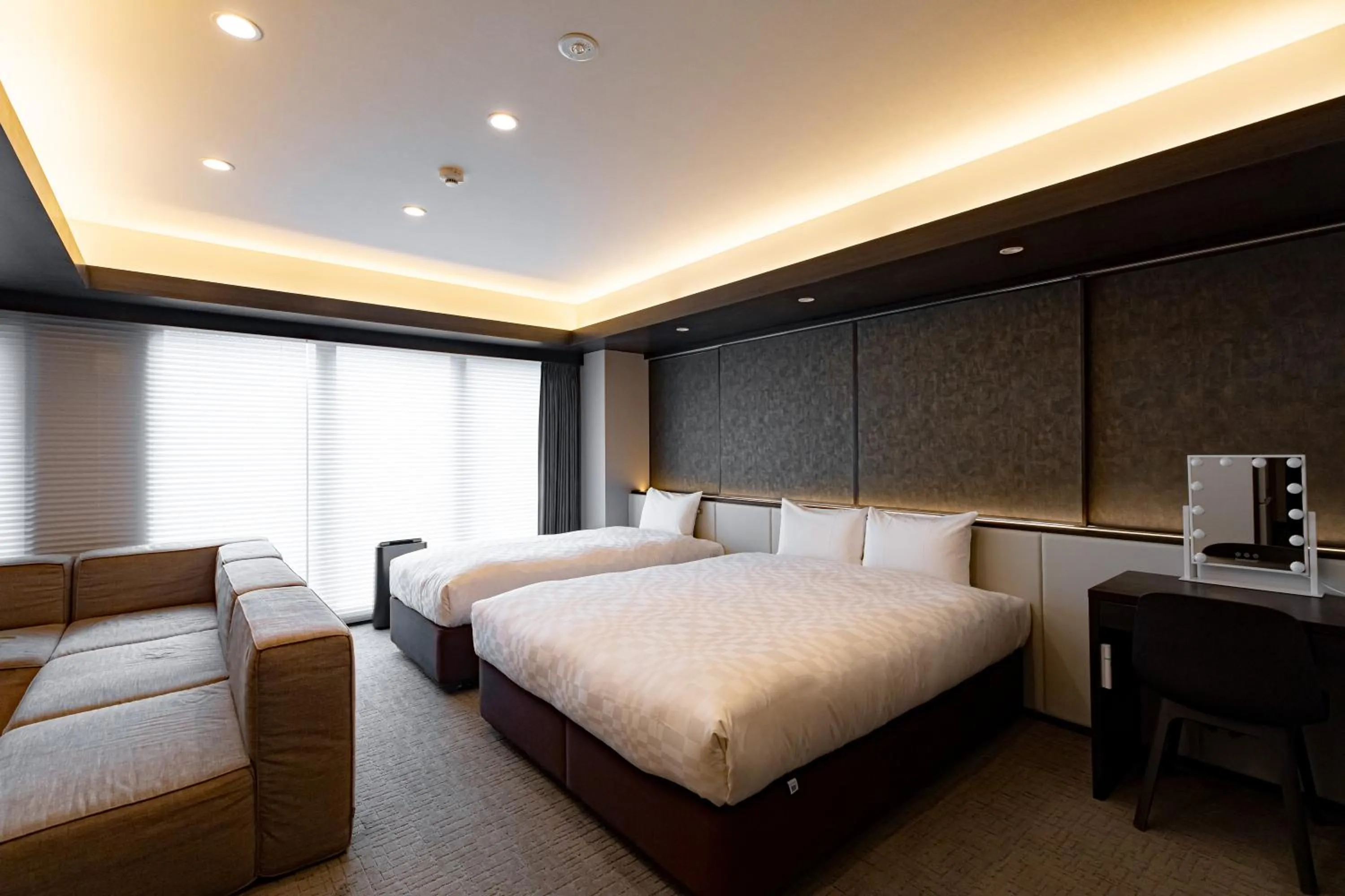 Bed in GOLD STAY Nagoya Osu