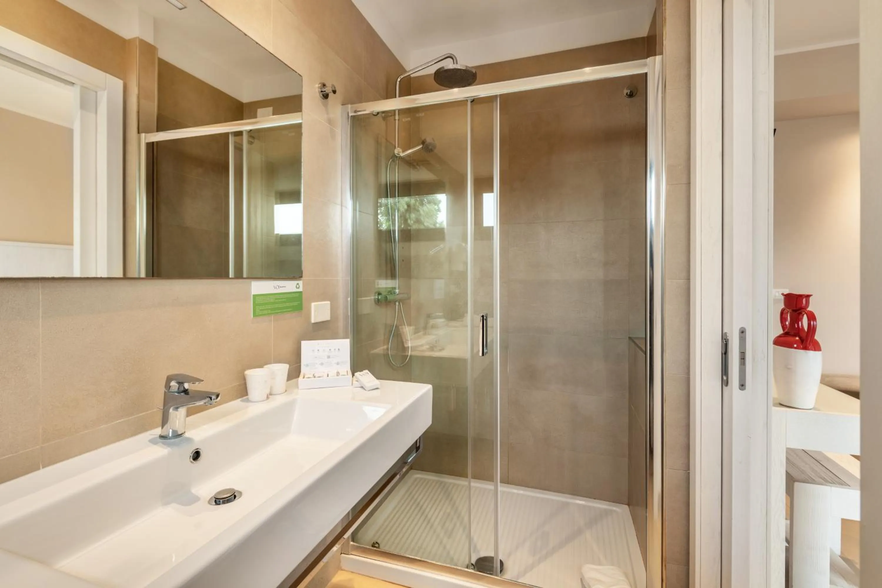 Bathroom in VOI Alimini Resort