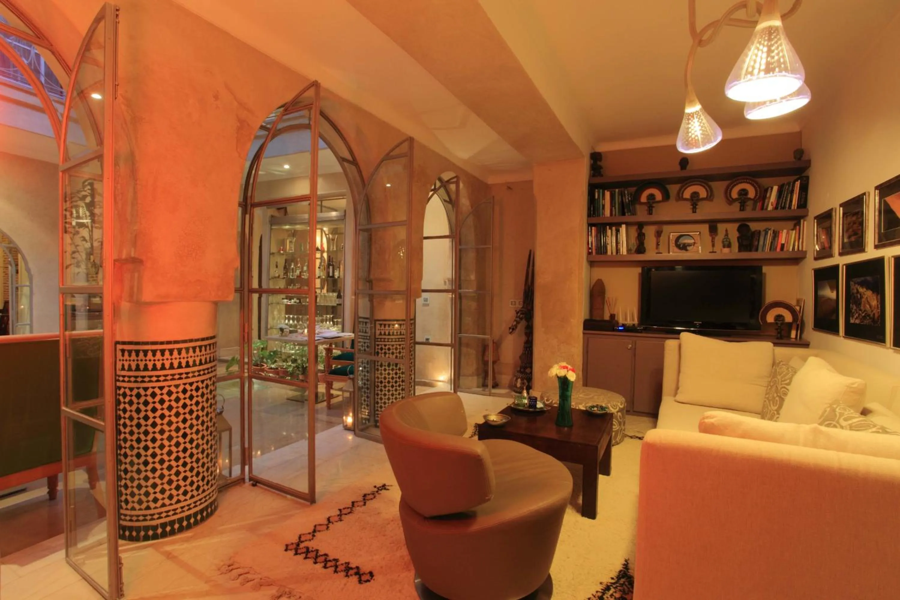 Communal lounge/ TV room in Riad Infinity Sea