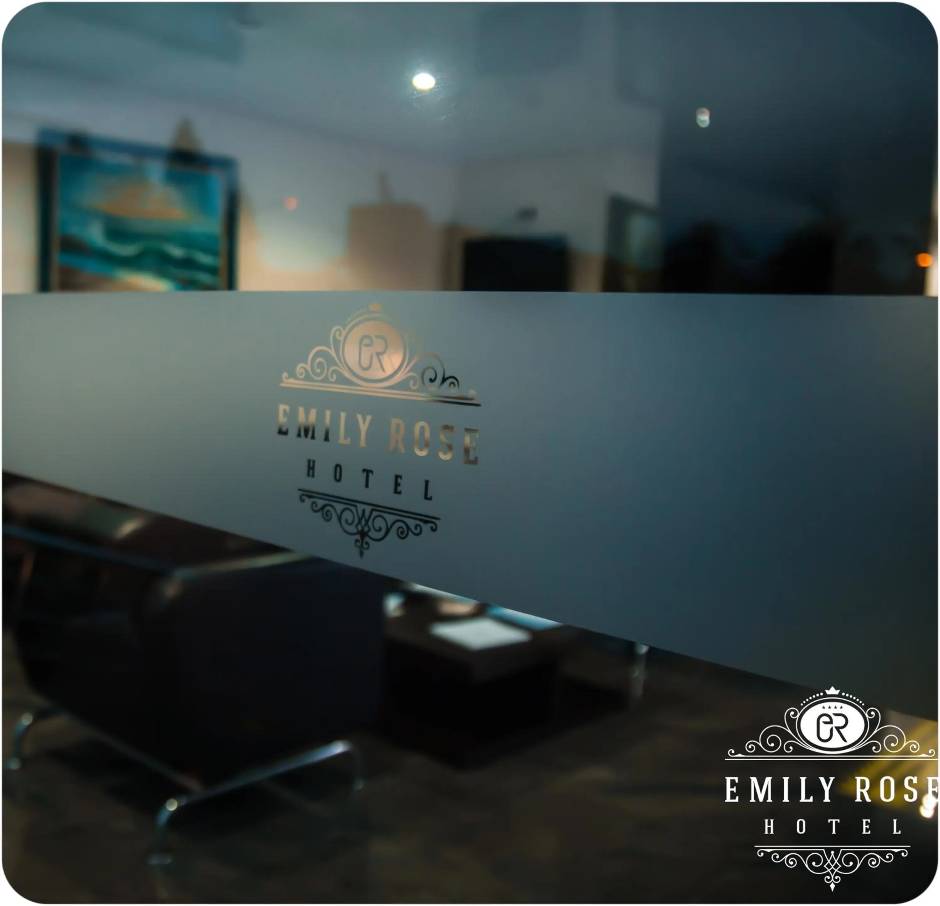 Property logo or sign in Emily Rose Hotel