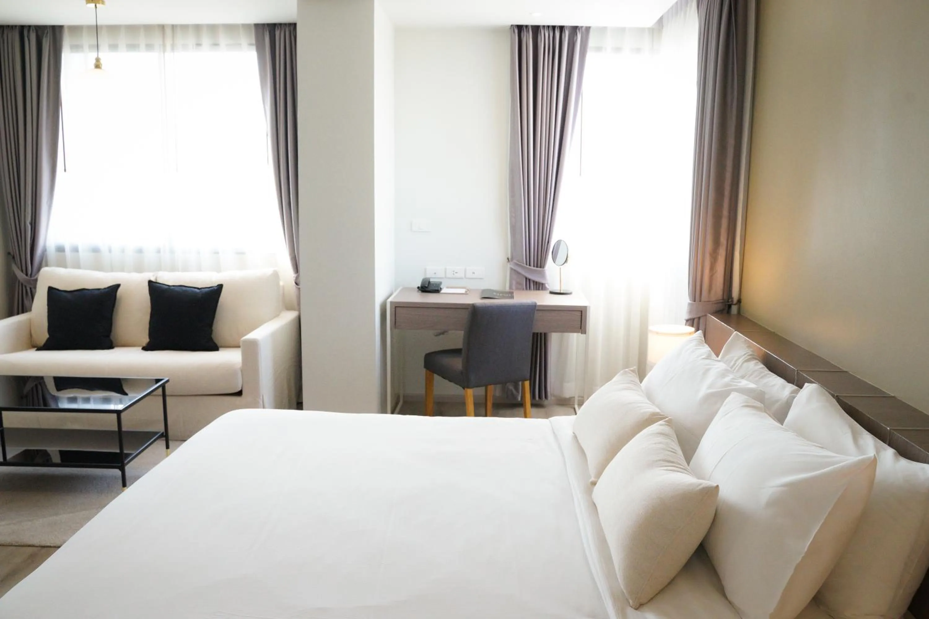 Bedroom, Bed in The Rise Suites Hotel, Chiang Mai - SHA Extra Plus