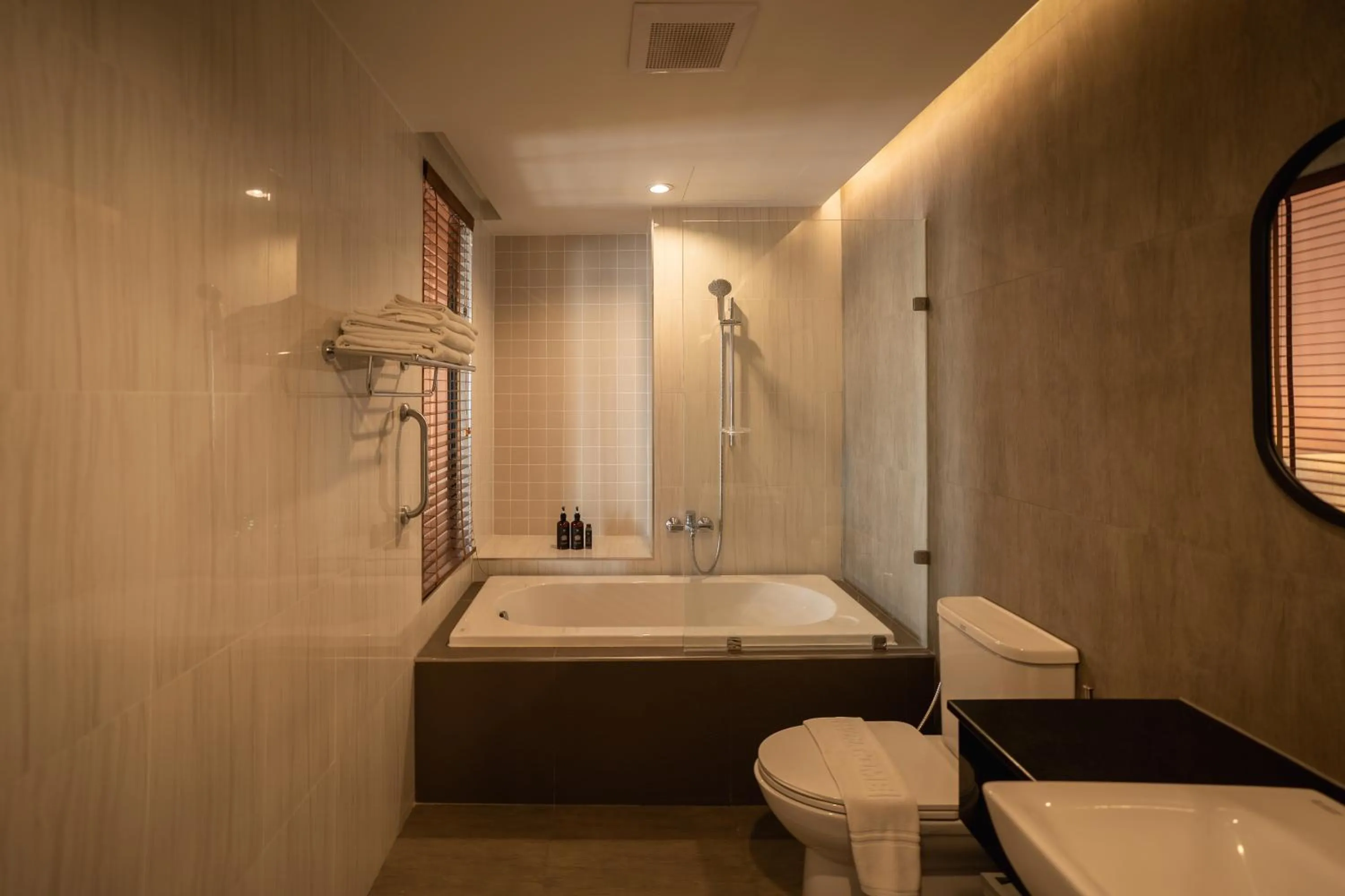 Bathroom in The Rise Suites Hotel, Chiang Mai - SHA Extra Plus