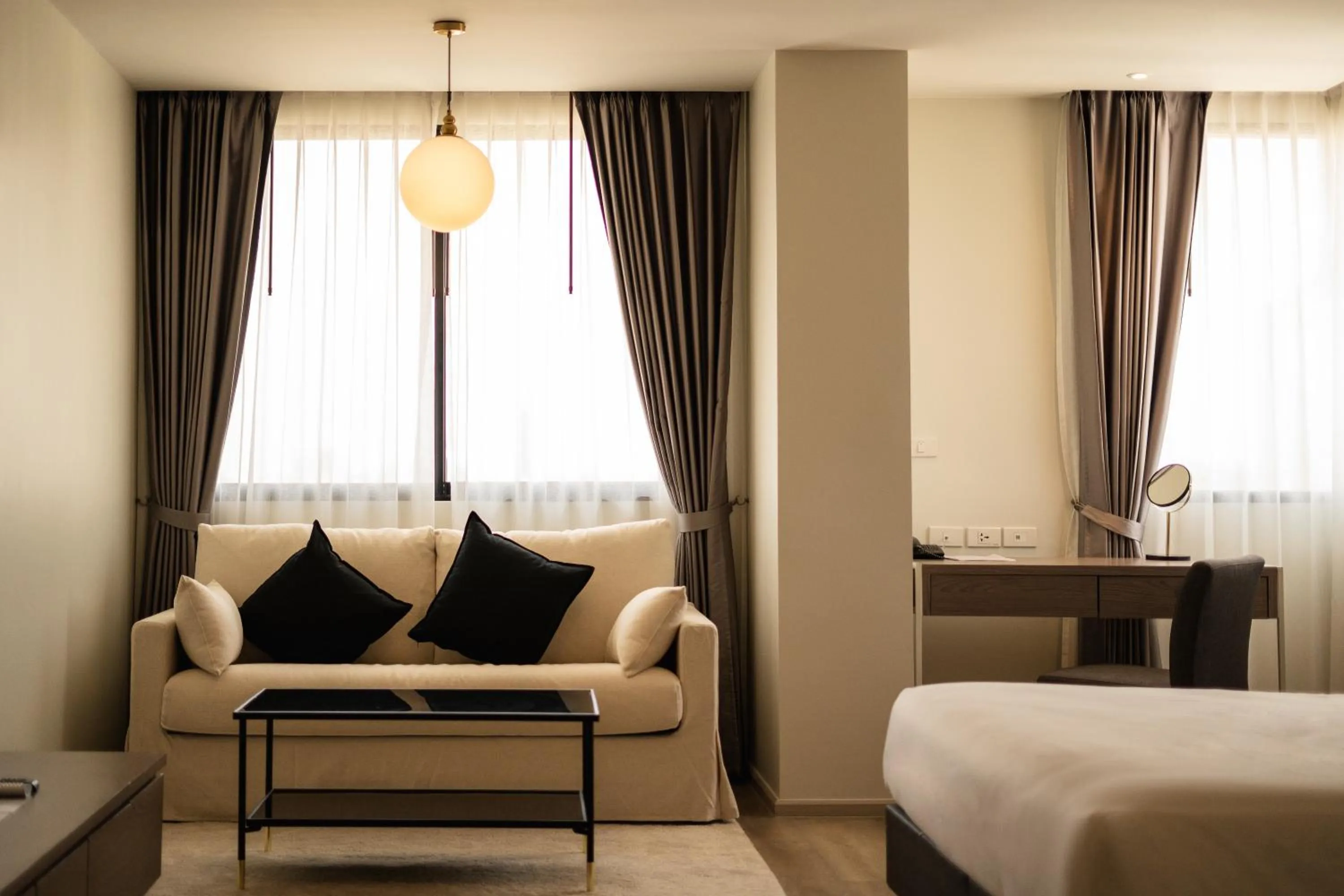 Living room, Bed in The Rise Suites Hotel, Chiang Mai - SHA Extra Plus