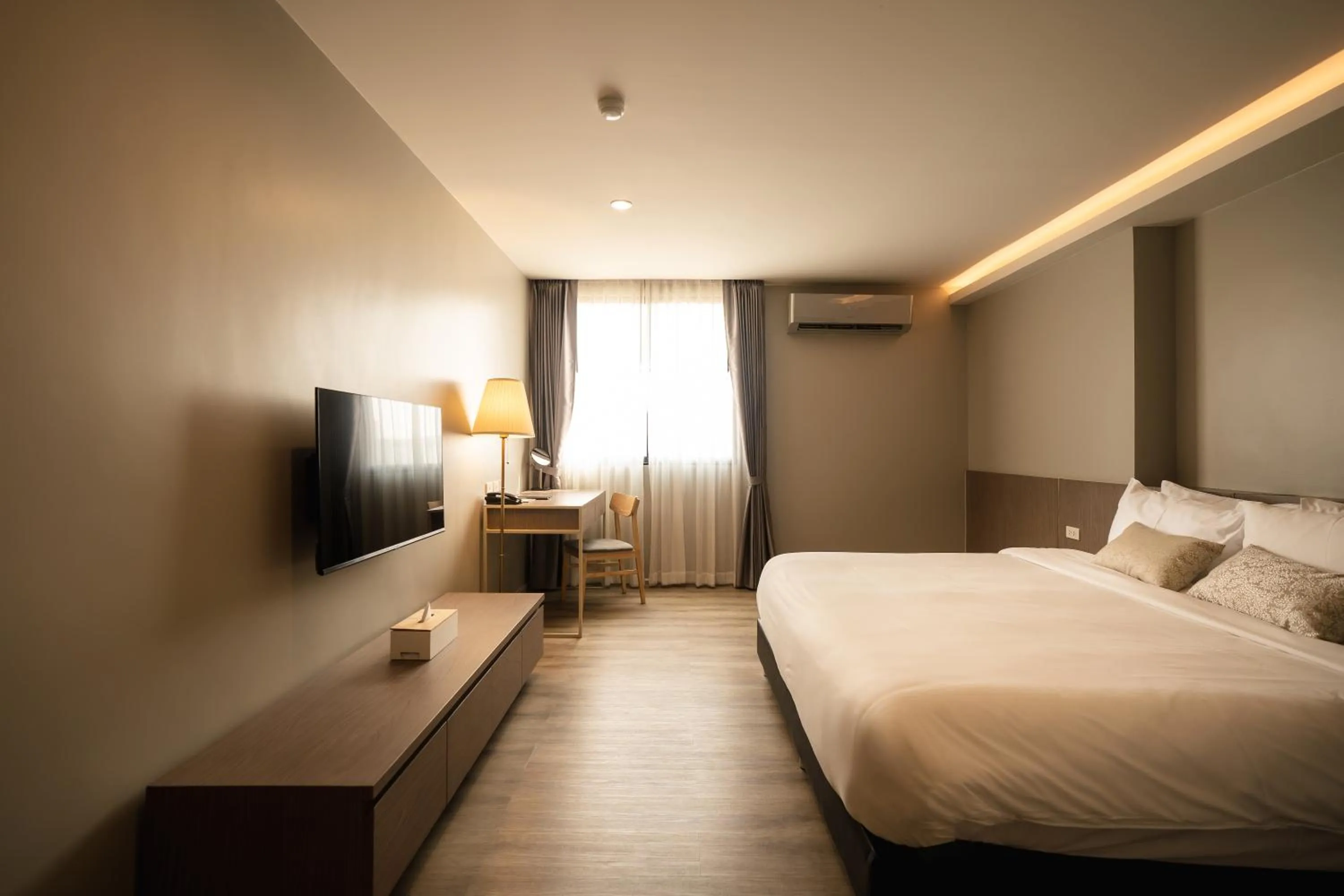 Bedroom, Bed in The Rise Suites Hotel, Chiang Mai - SHA Extra Plus