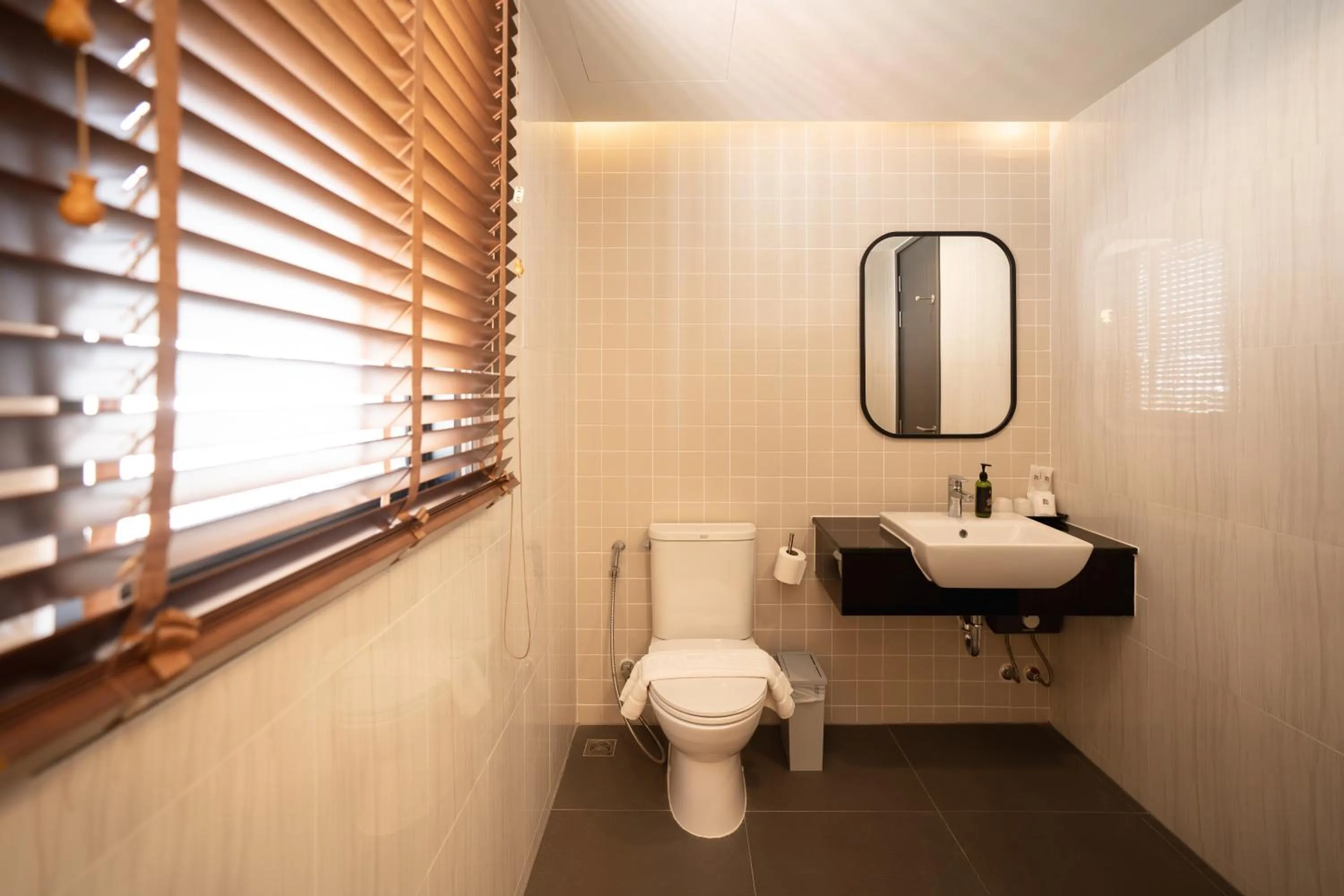 Toilet in The Rise Suites Hotel, Chiang Mai - SHA Extra Plus