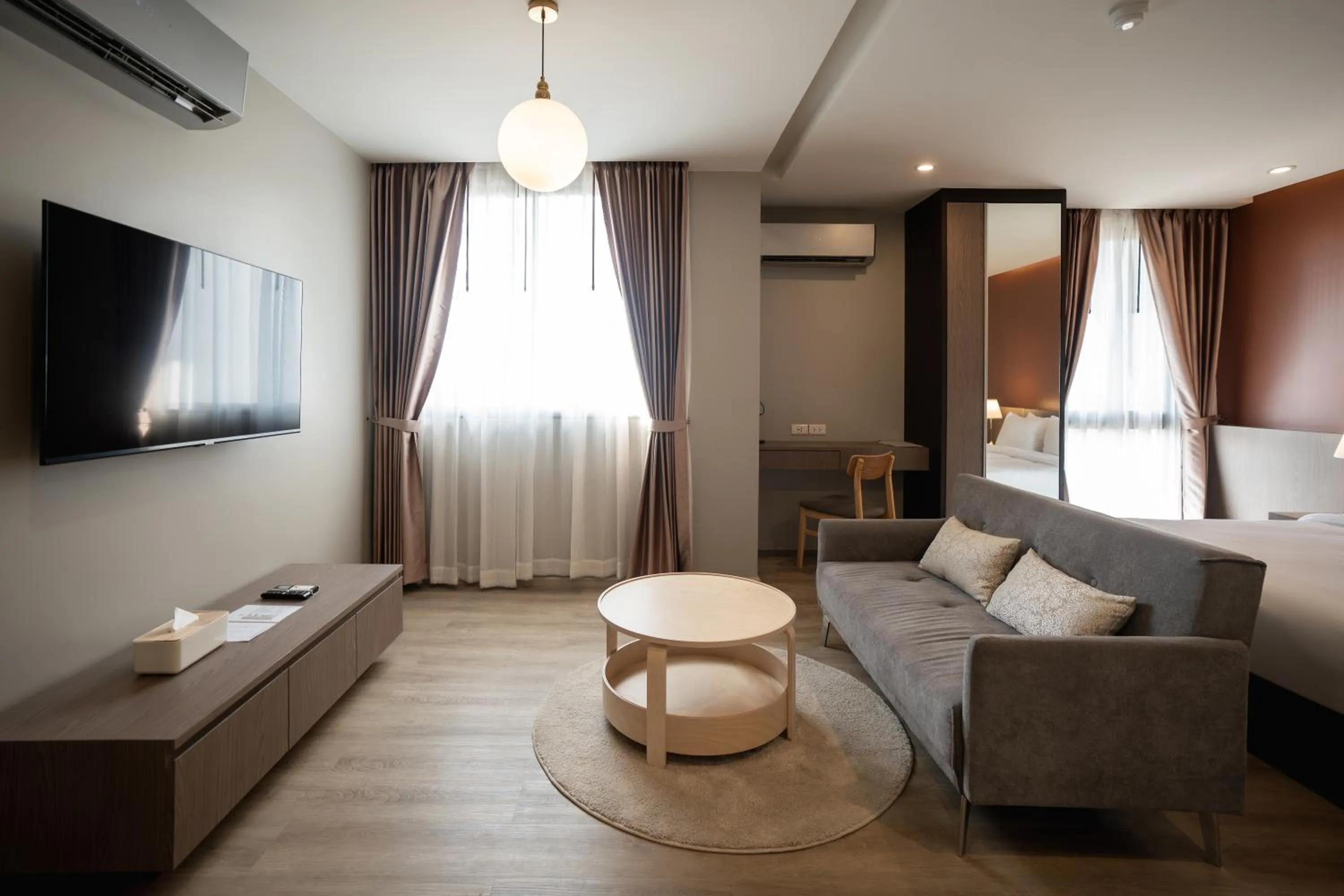 Living room, Bed in The Rise Suites Hotel, Chiang Mai - SHA Extra Plus