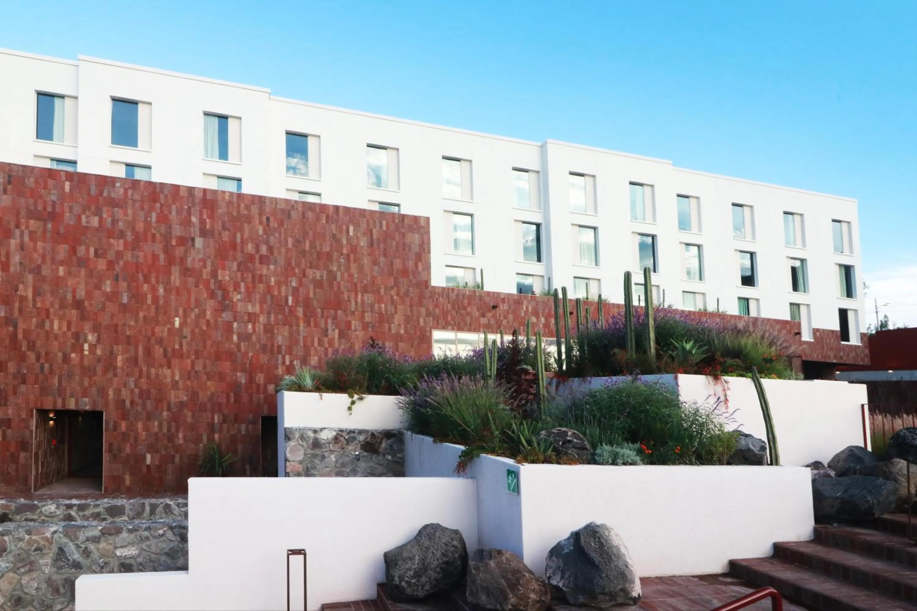 Inner courtyard view in Albor San Miguel de Allende, Tapestry Collection by Hilton