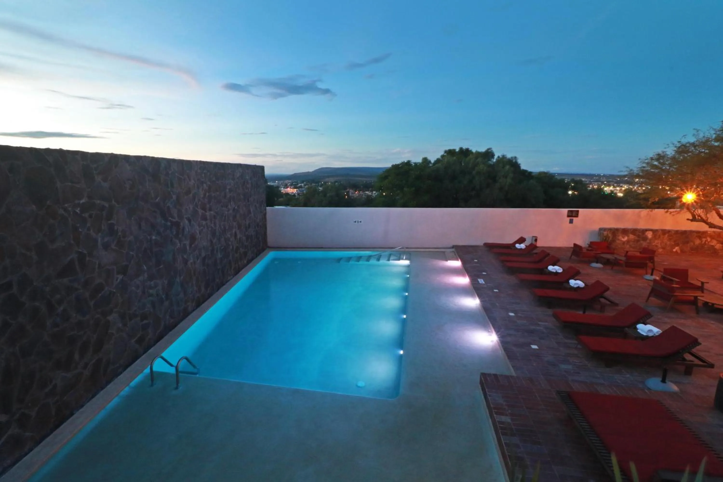 Pool view in Albor San Miguel de Allende, Tapestry Collection by Hilton