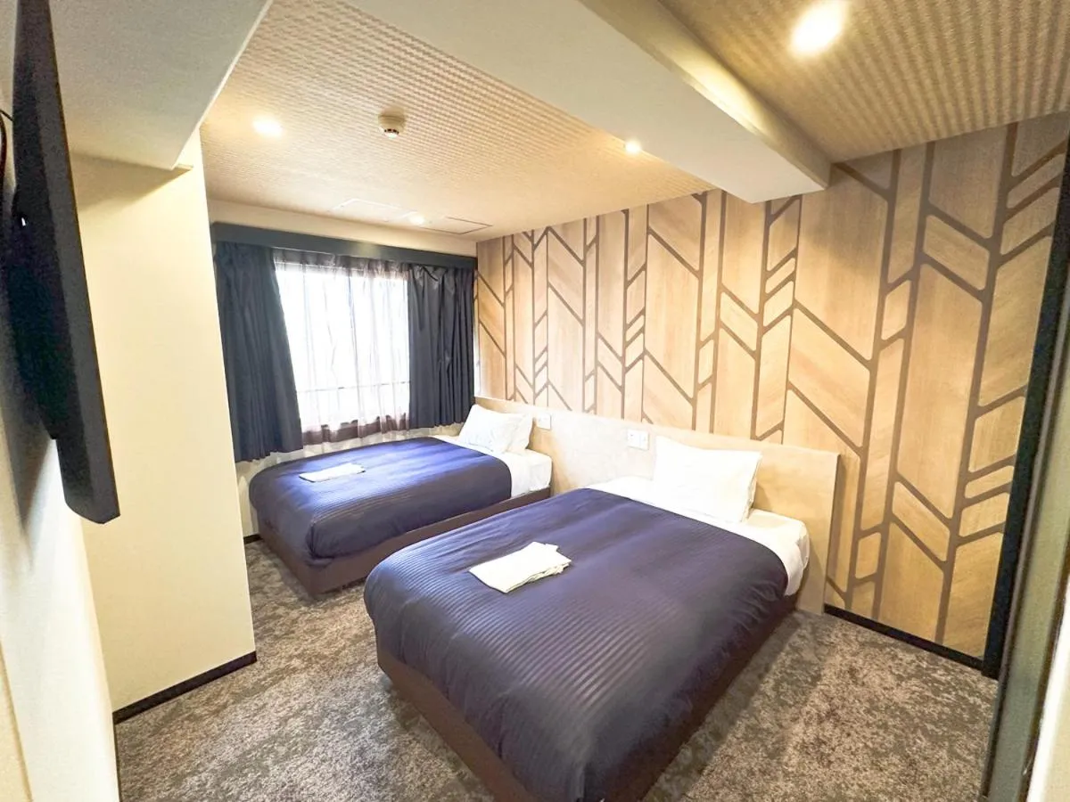 Bed in Hotel Livemax BUDGET Umeda