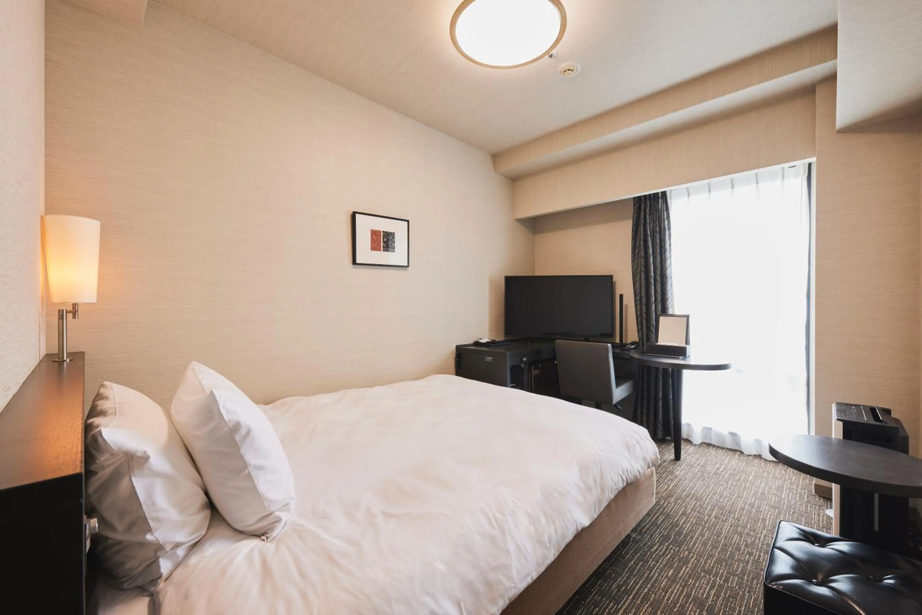 Bed in Richmond Hotel Nagasaki Shianbashi