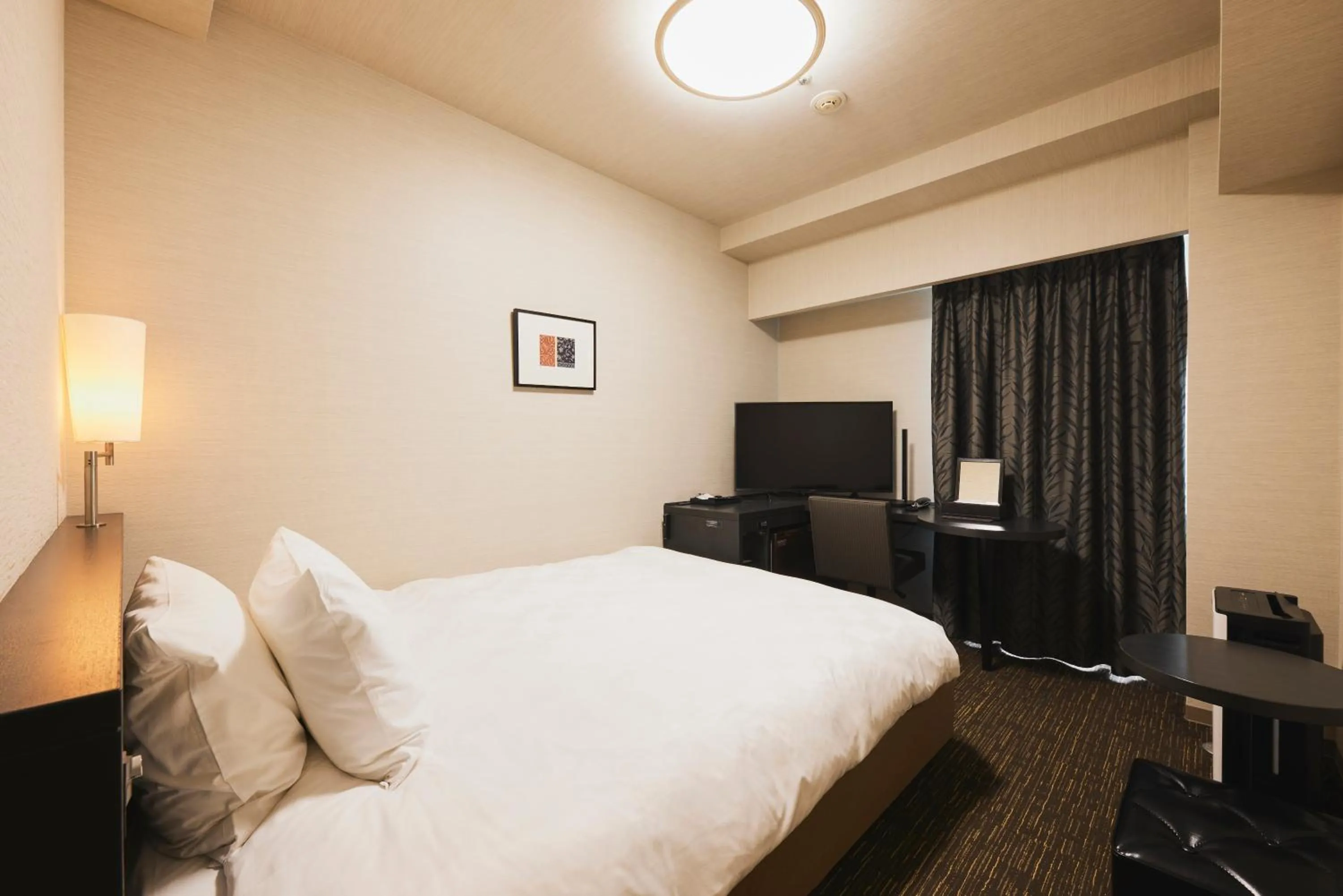 Bed in Richmond Hotel Nagasaki Shianbashi