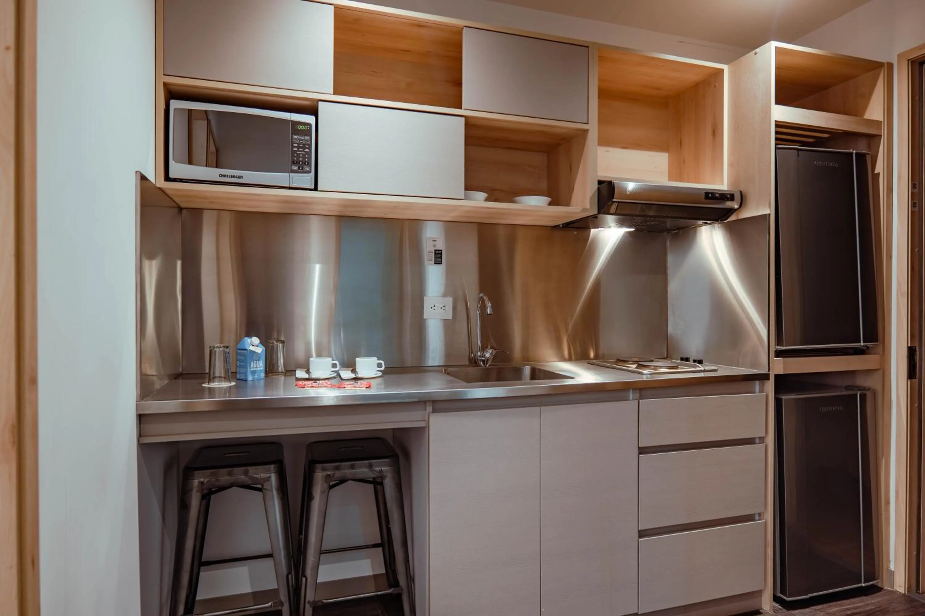 Kitchen or kitchenette in UMA Suites Chia