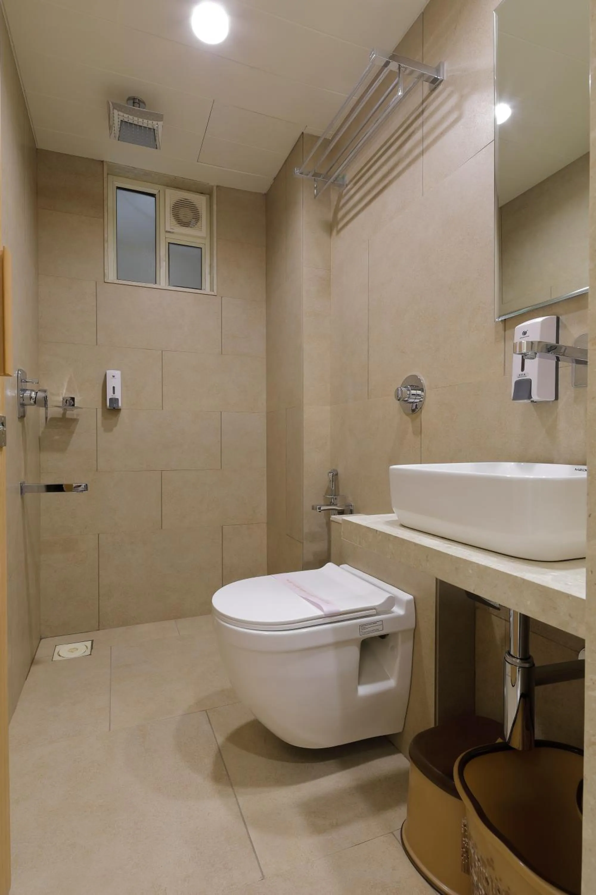 Bathroom in Hotel Elysian Residency