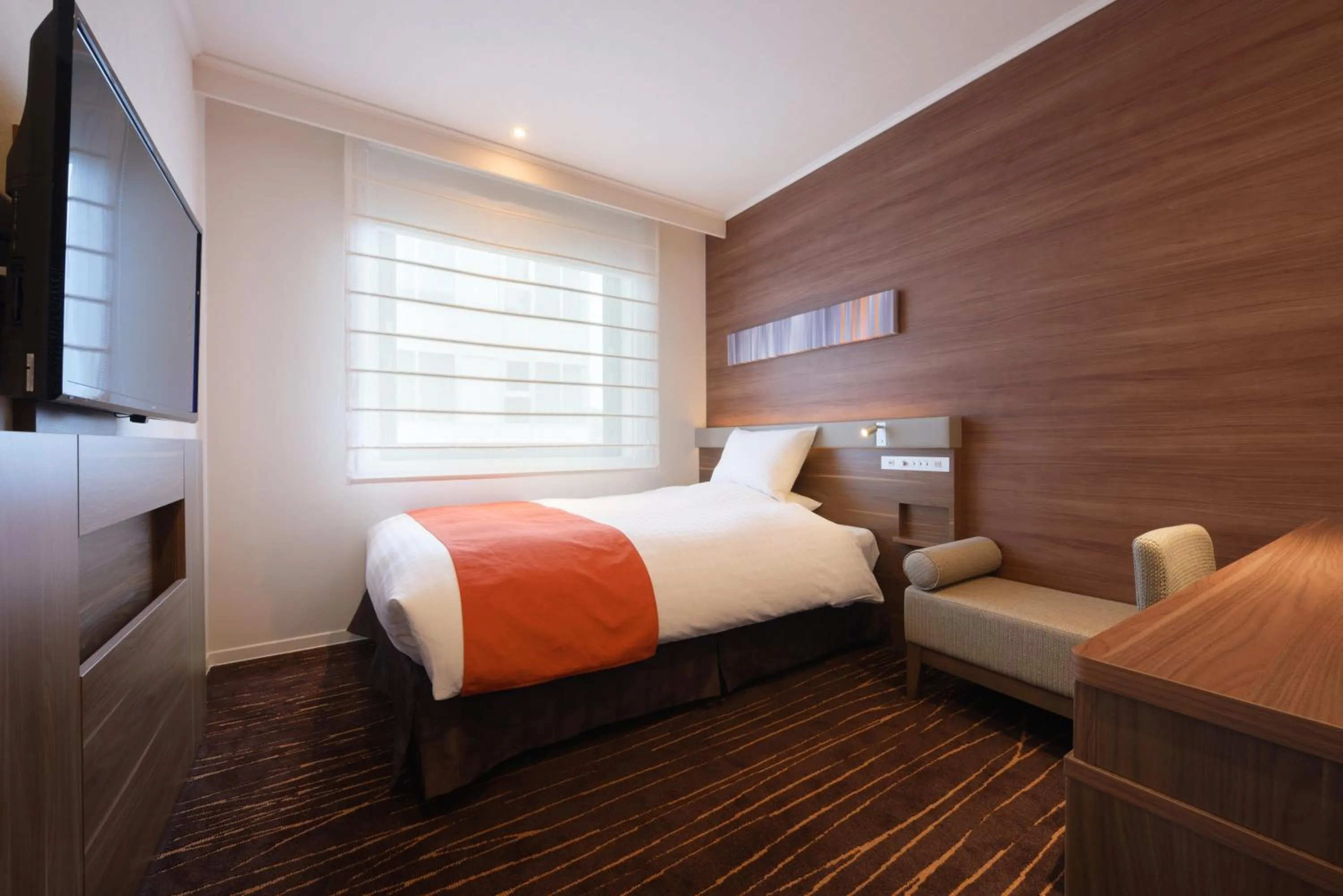 Bed in Hotel JAL City Sendai