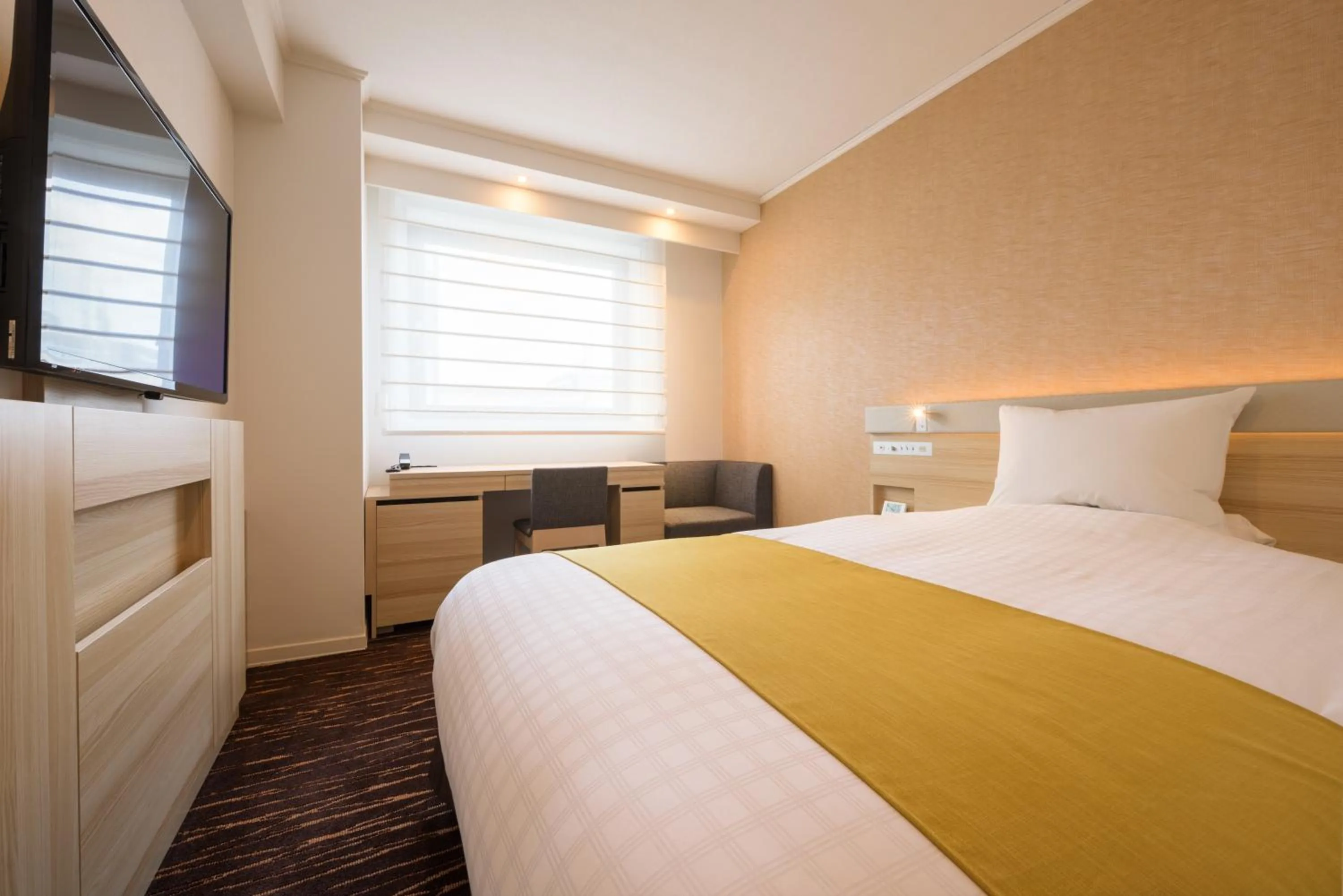 Bed in Hotel JAL City Sendai