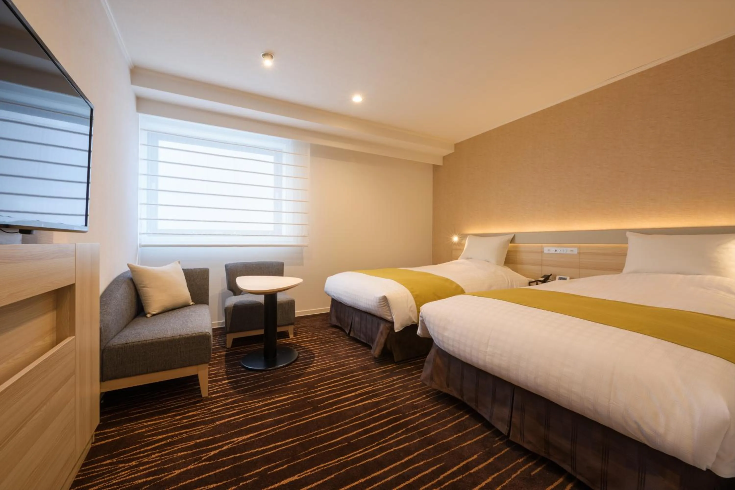 Bed in Hotel JAL City Sendai