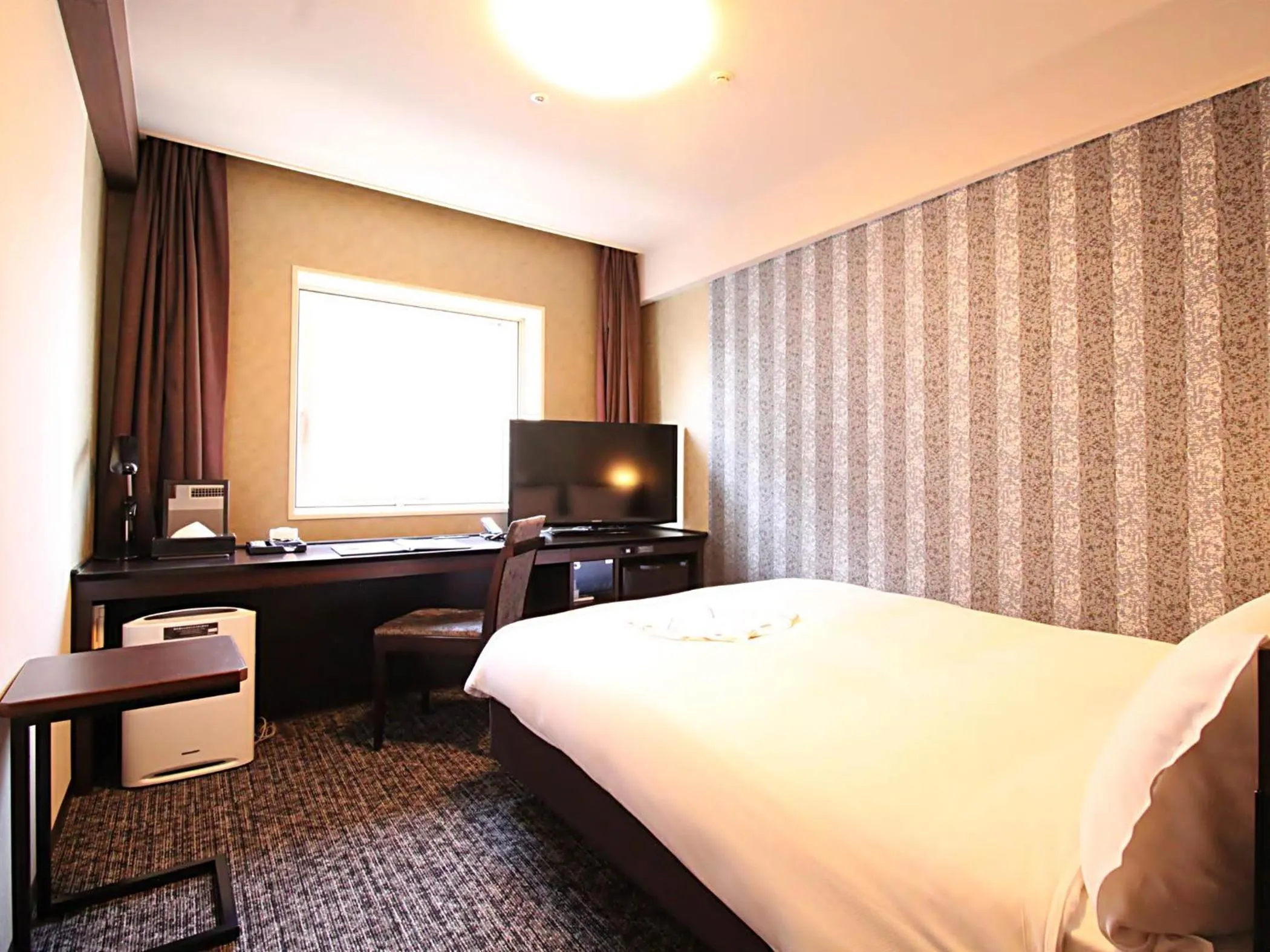 Bed in Richmond Hotel Kochi