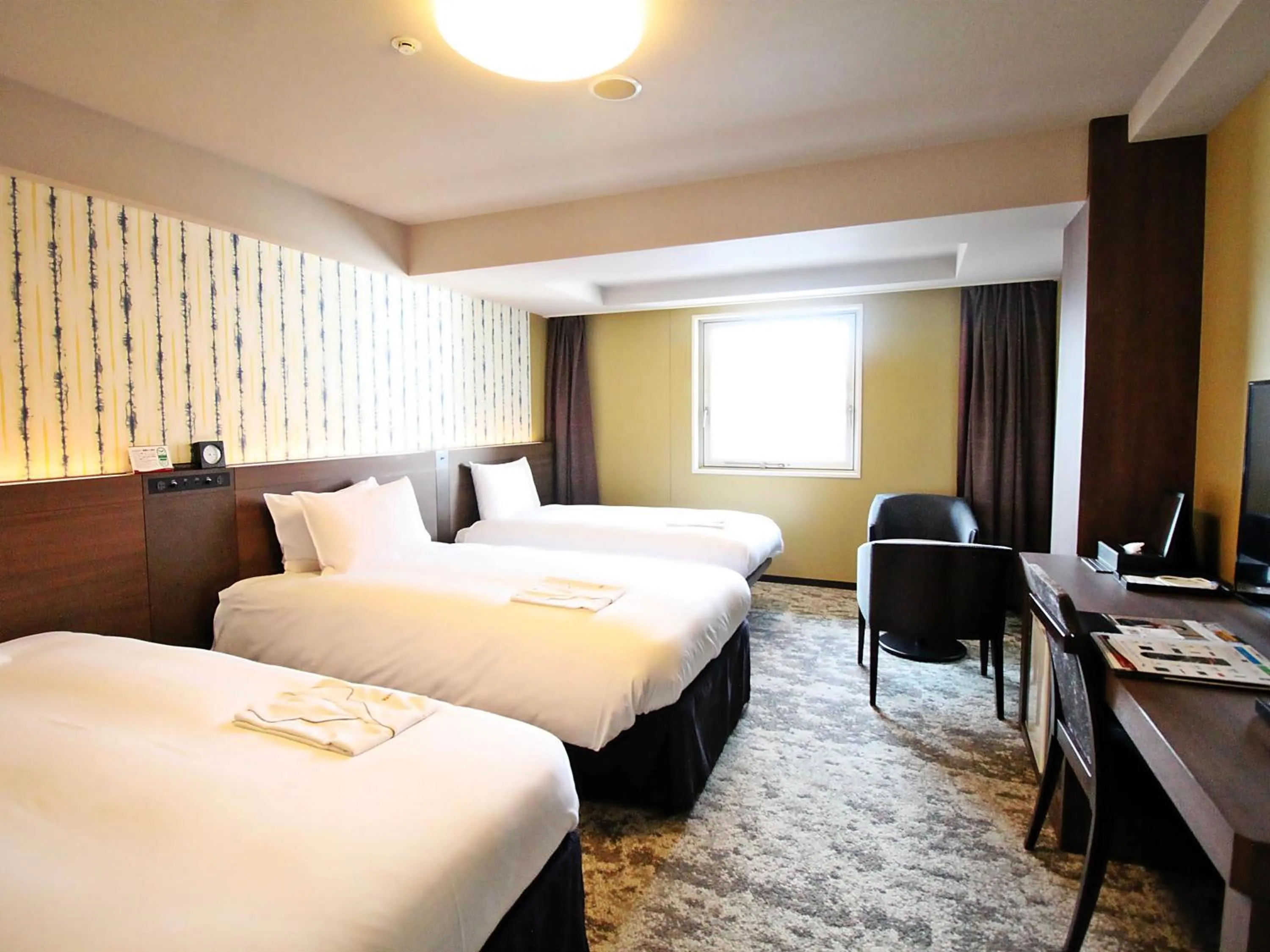 Bed in Richmond Hotel Kochi