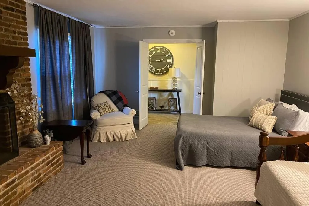 Photo of the whole room, Bed in The Crimson - Game Day Rental