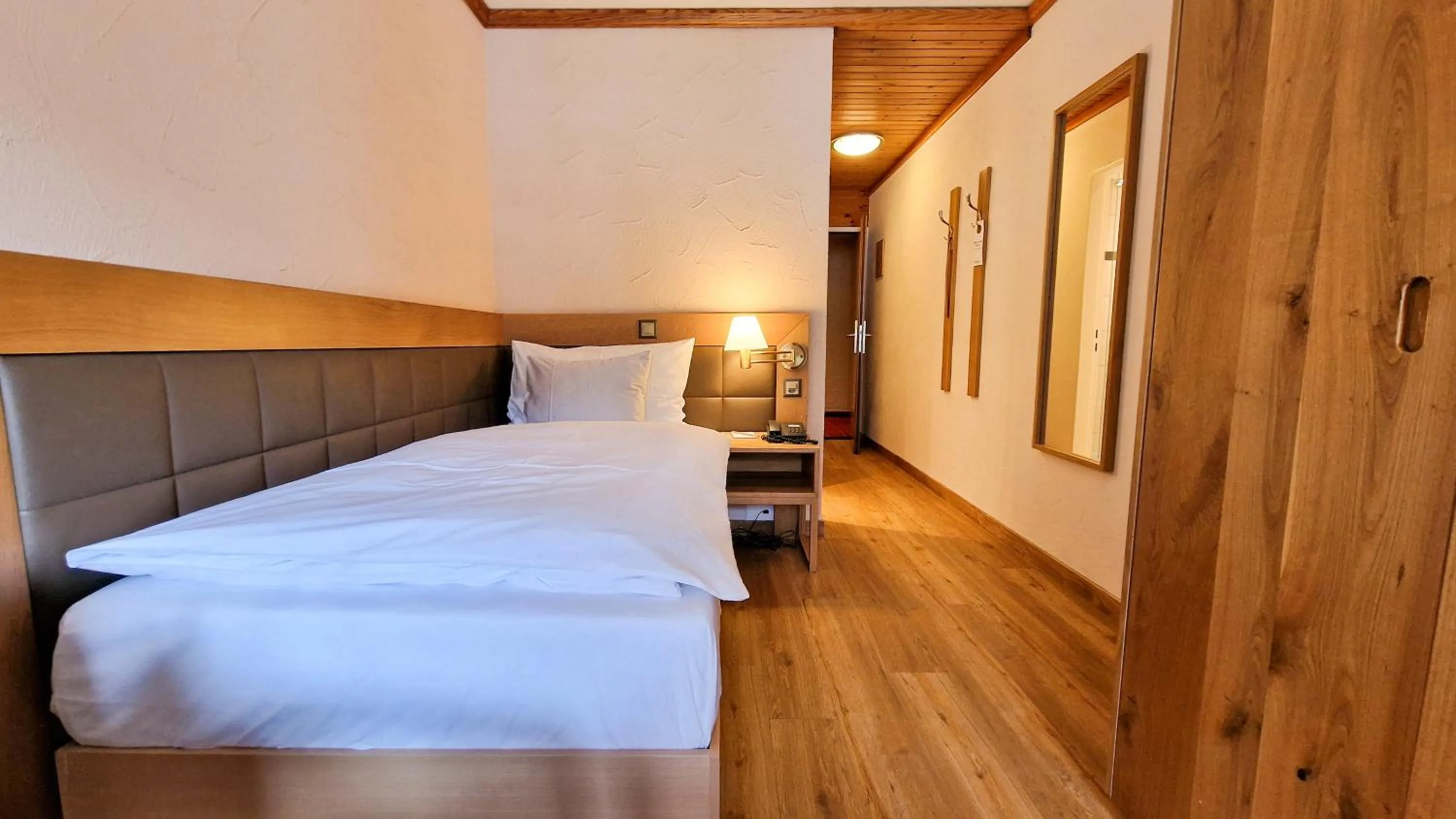 Photo of the whole room, Bed in Sunstar Hotel Lenzerheide
