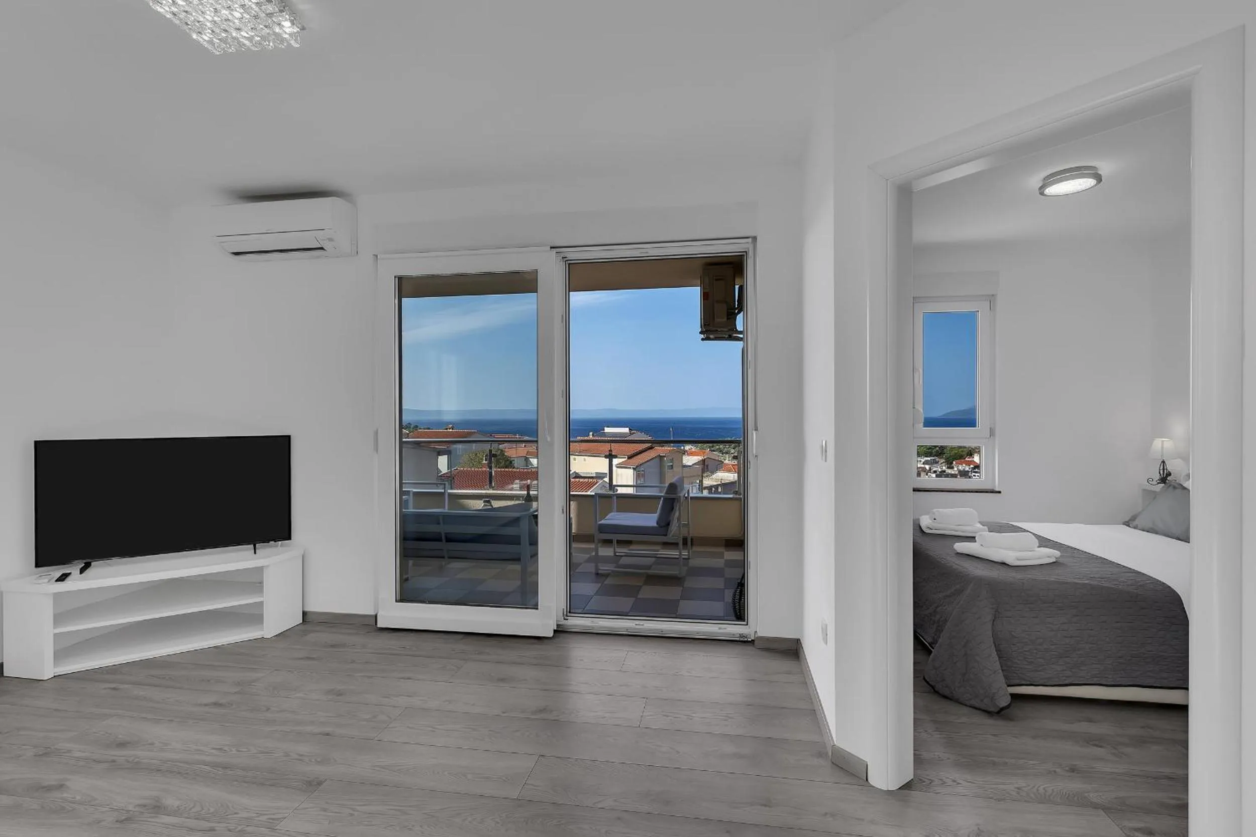 Communal lounge/ TV room in Sea View Apartments Dammi with free parking