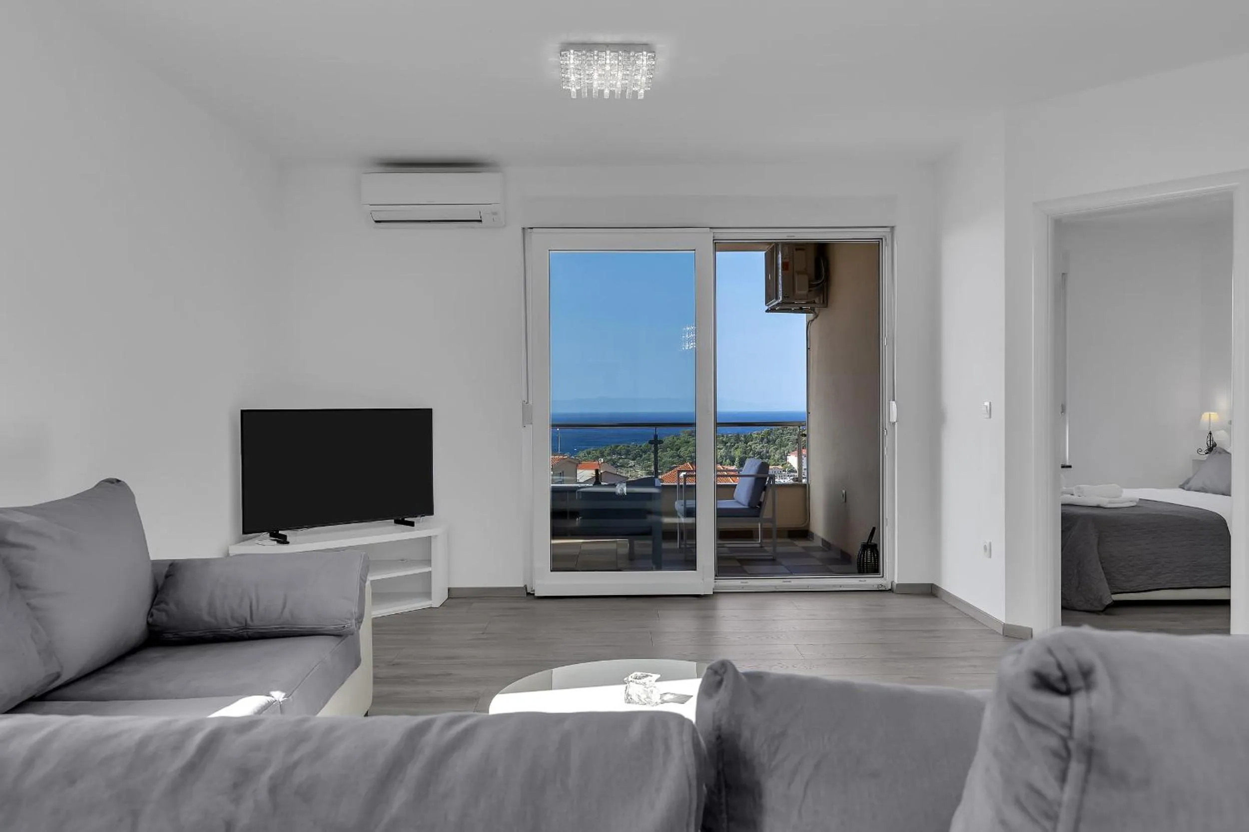 Communal lounge/ TV room in Sea View Apartments Dammi with free parking