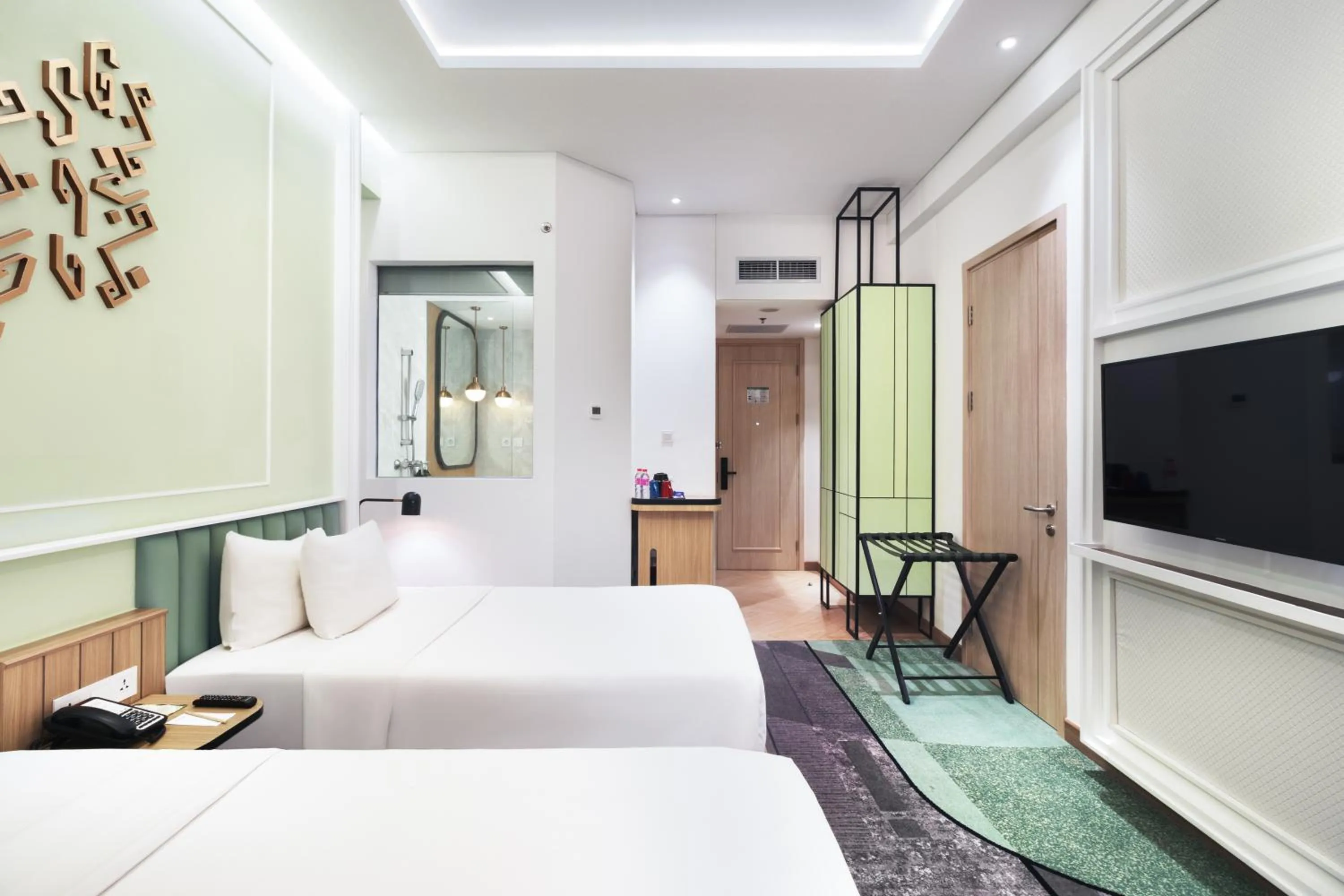 Bed in Luwansa Hotel and Convention Center Manado