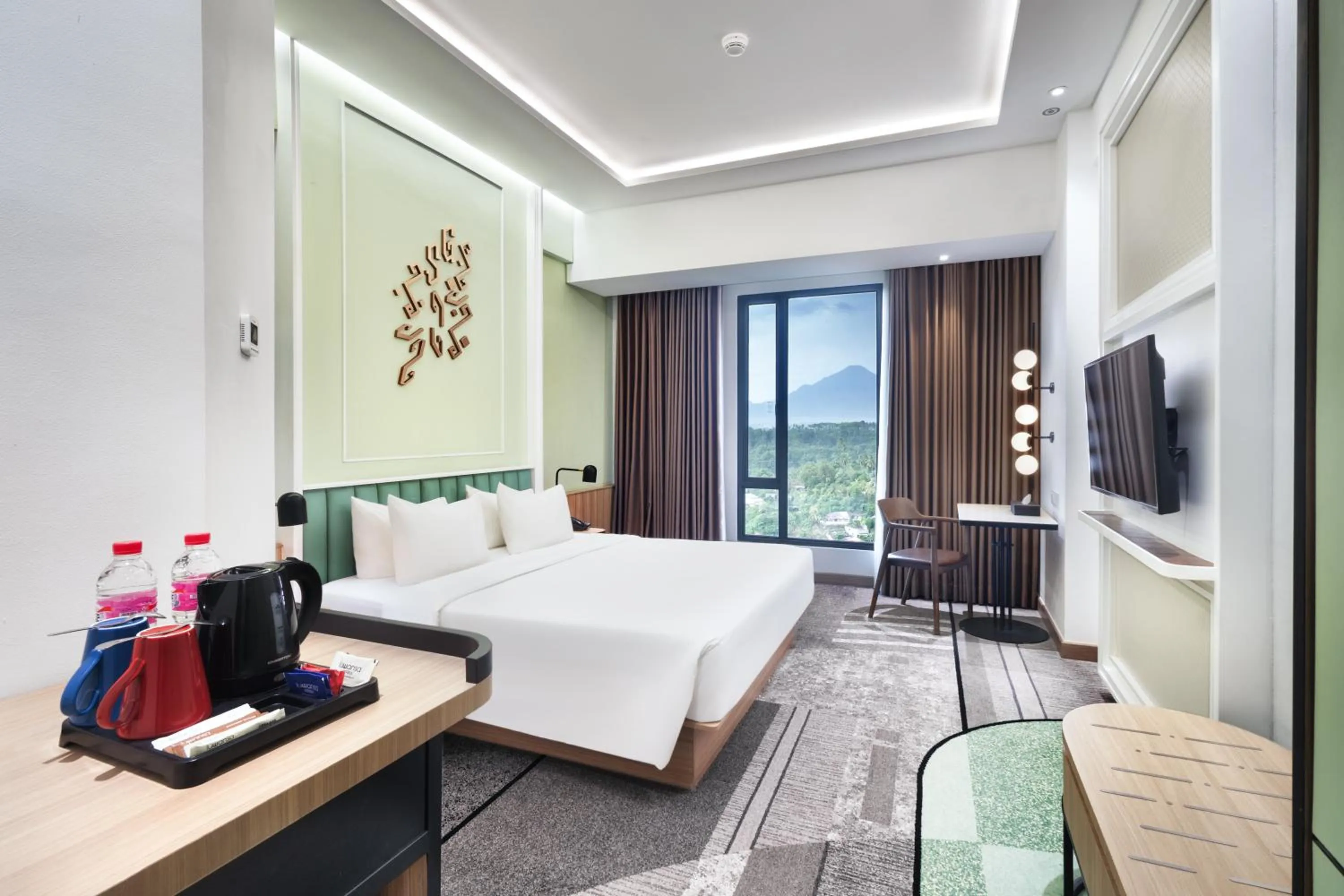 Bed in Luwansa Hotel and Convention Center Manado