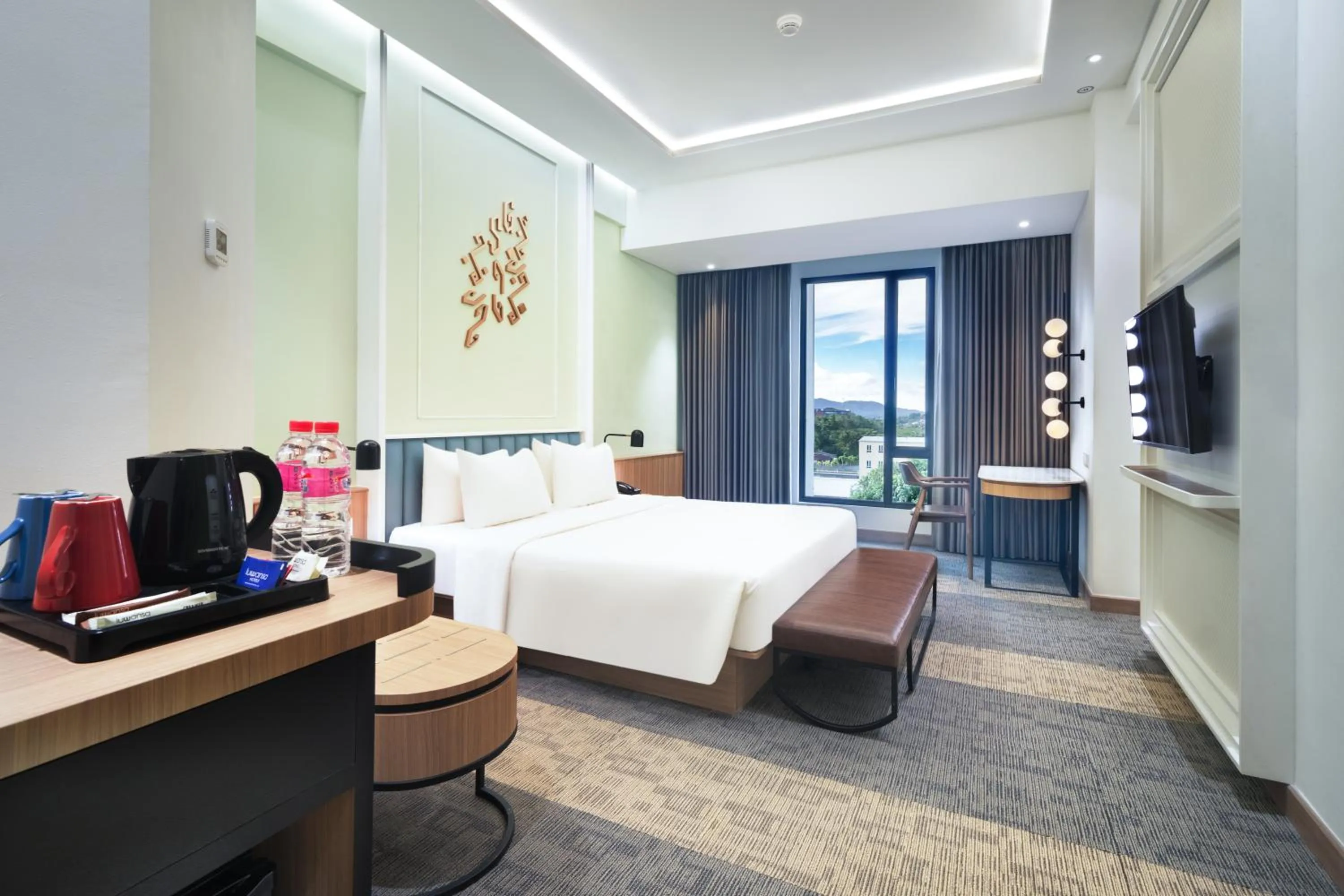 Bed in Luwansa Hotel and Convention Center Manado