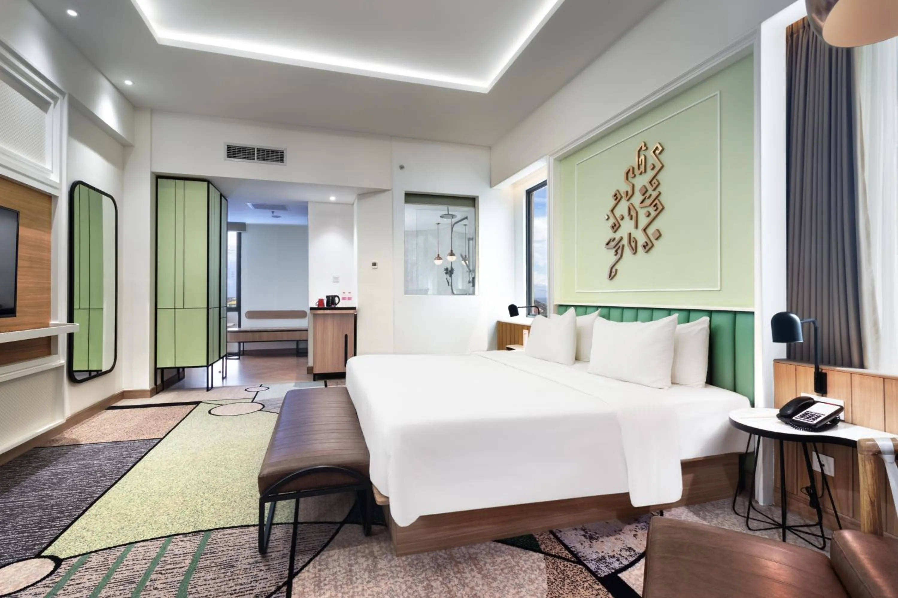 Bed in Luwansa Hotel and Convention Center Manado